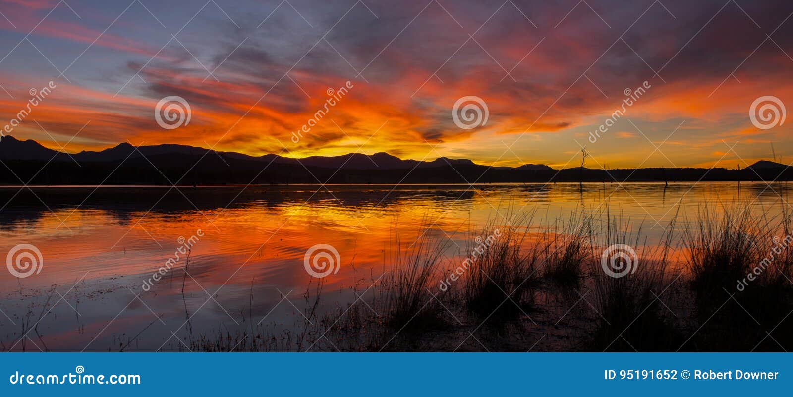 lake moogerah in queensland with beautiful clouds at sunset.