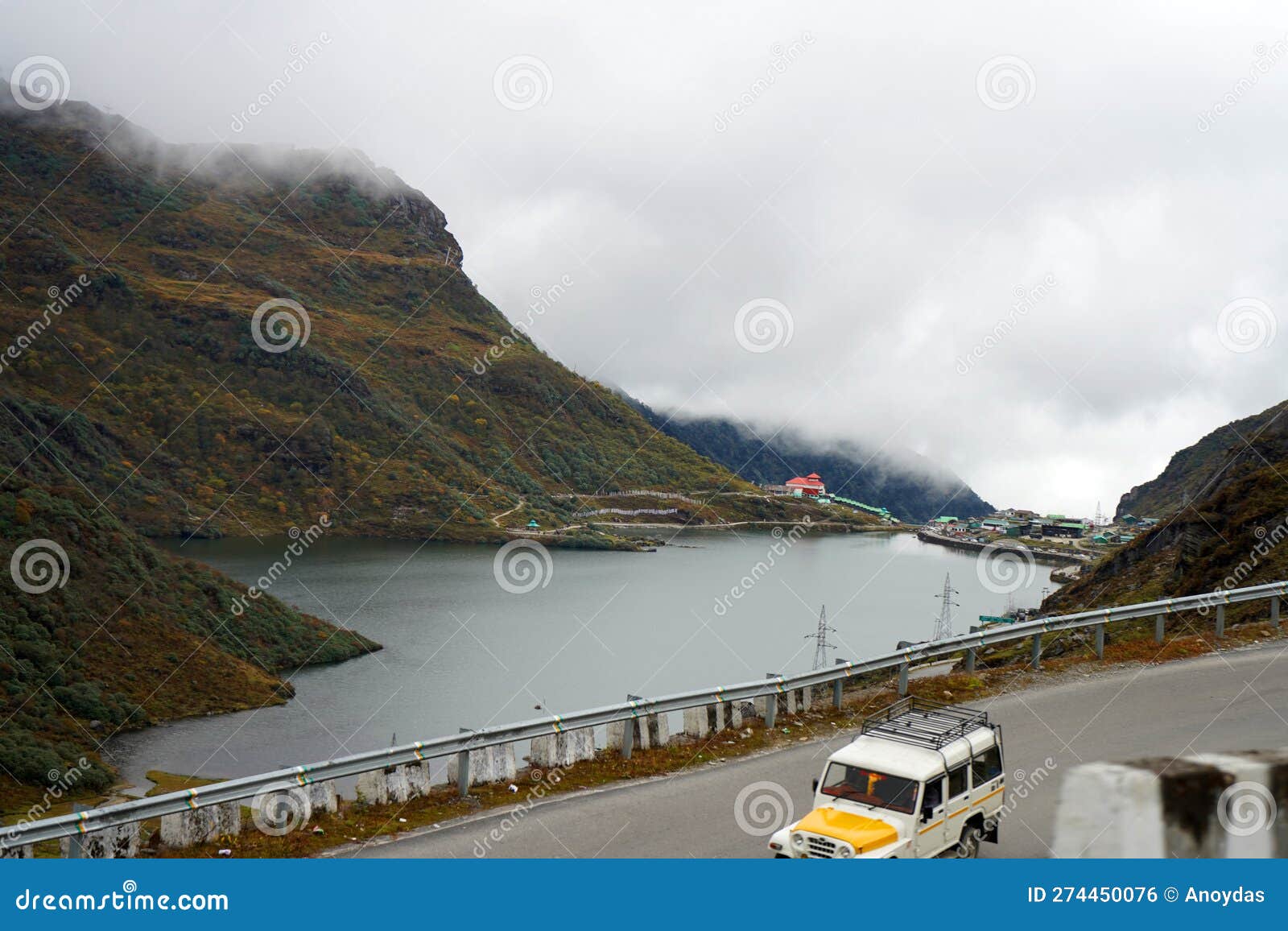 lake named tsomgo or changu in between mountain range at east sikkim