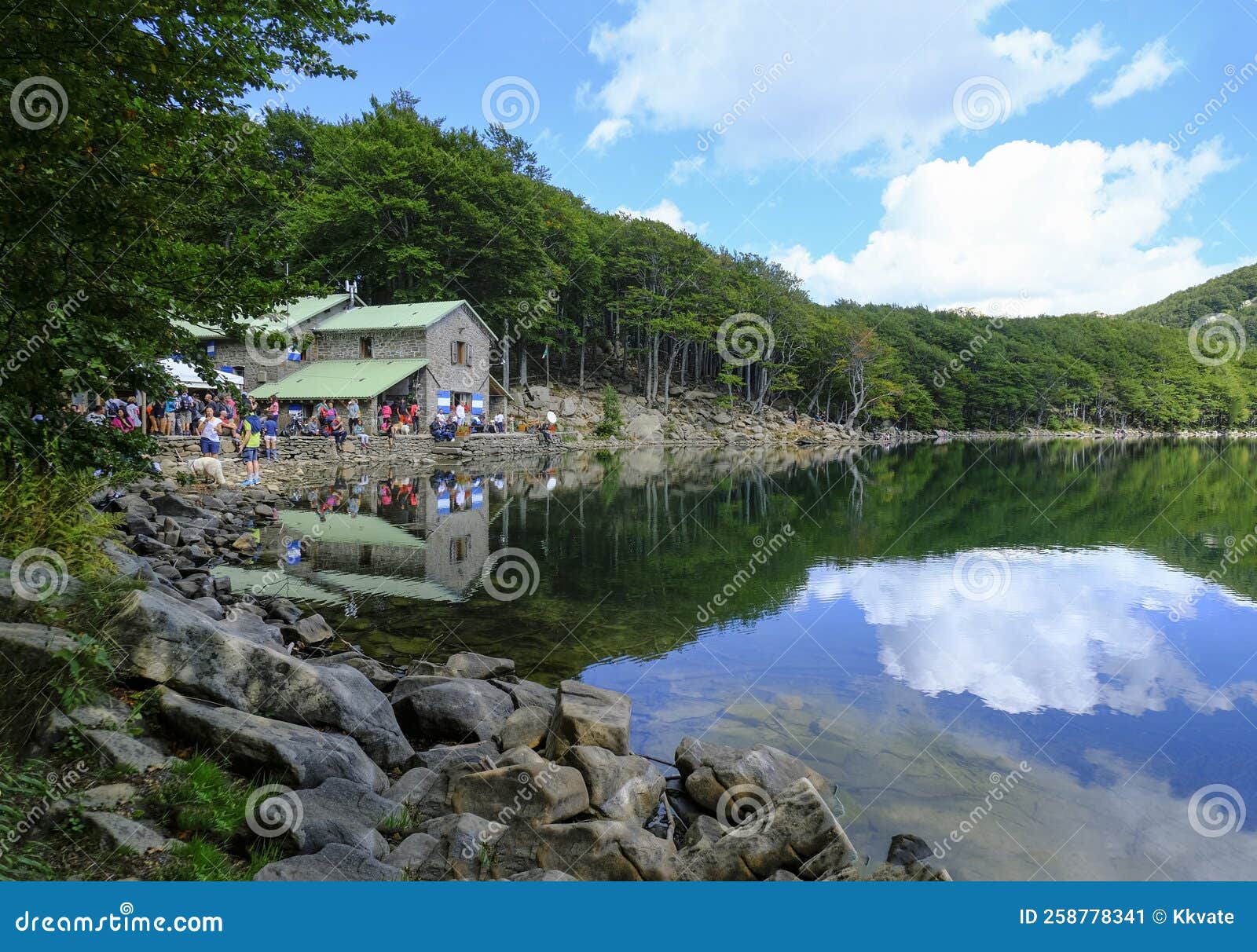lake santo, lago santo. shelter with tourists on lake. national park appennino tosco-emiliano. lagdei, emilia-romagna