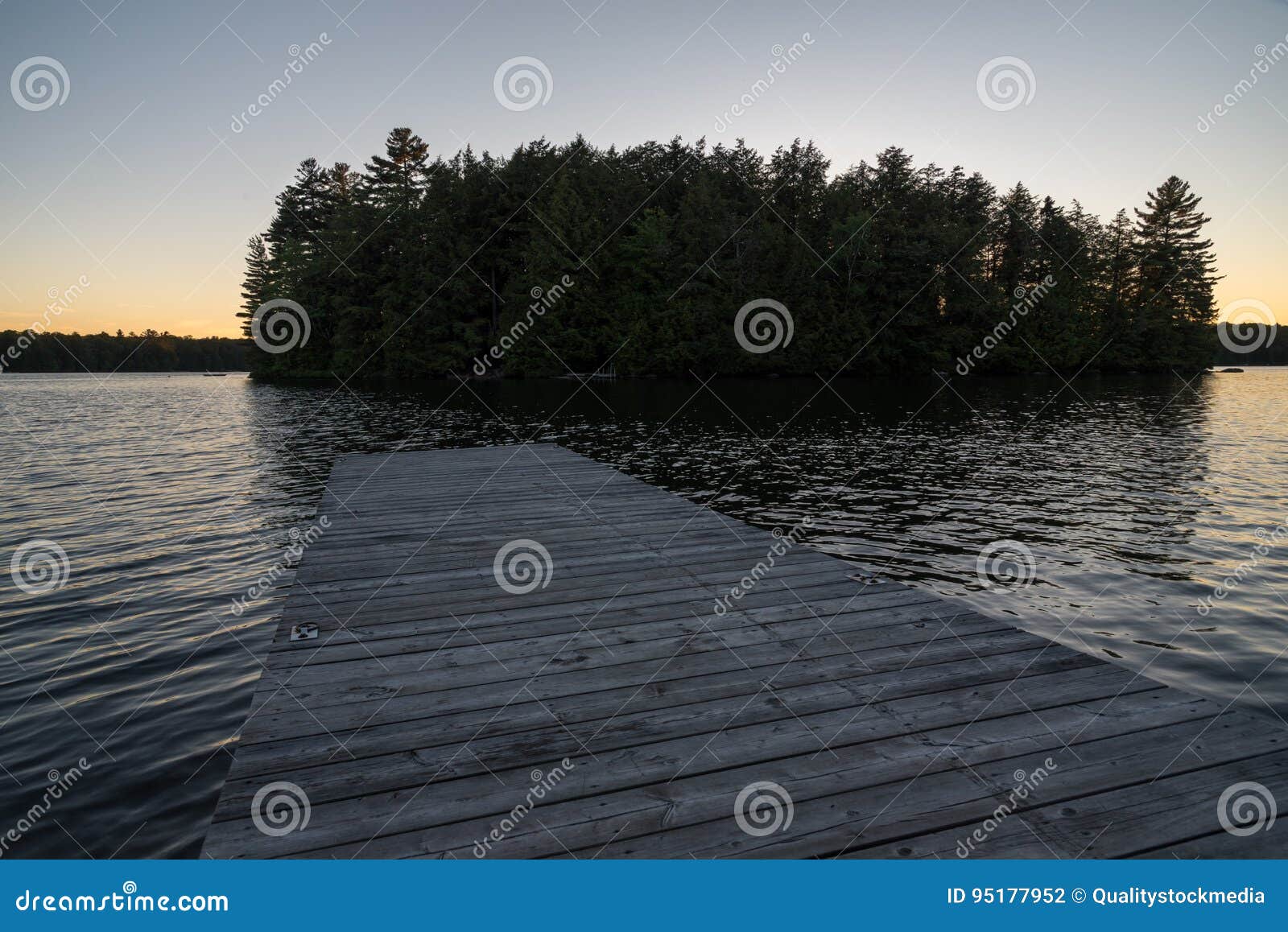 Lake at Sunset Dock stock photo. Image of muskoka, rough 95177952