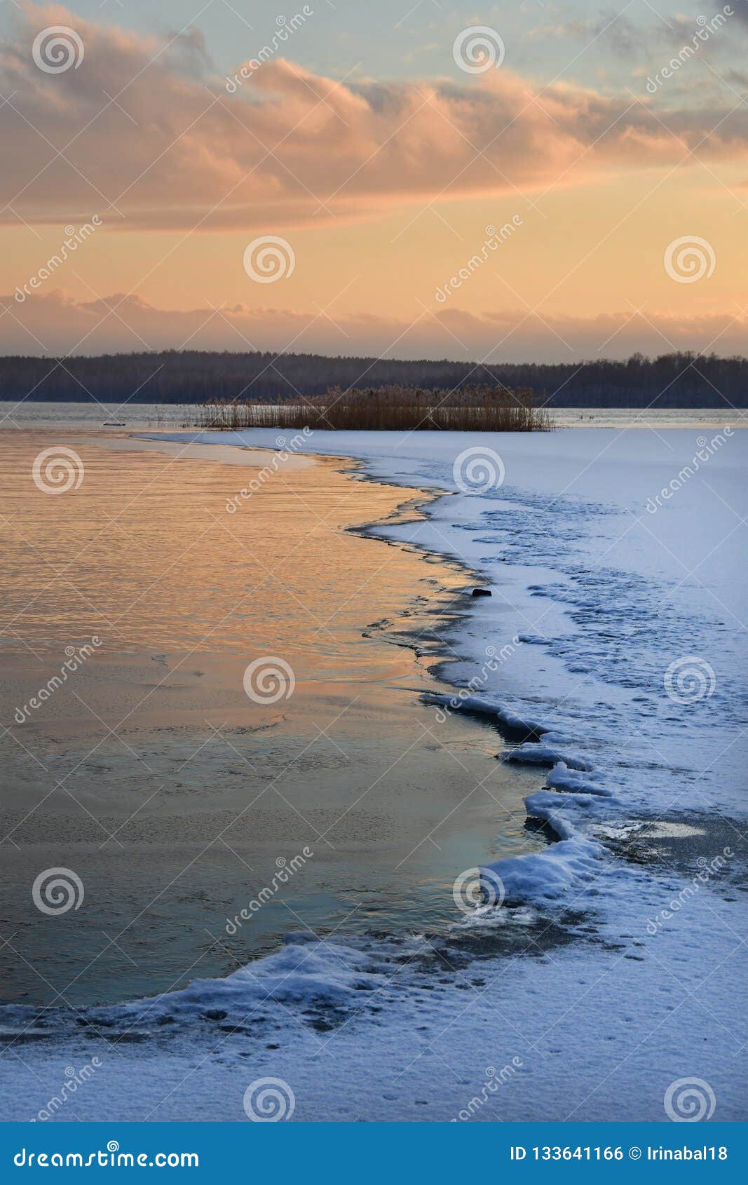 lake uvildy in november at sunset in late autumn, southern urals, rusia