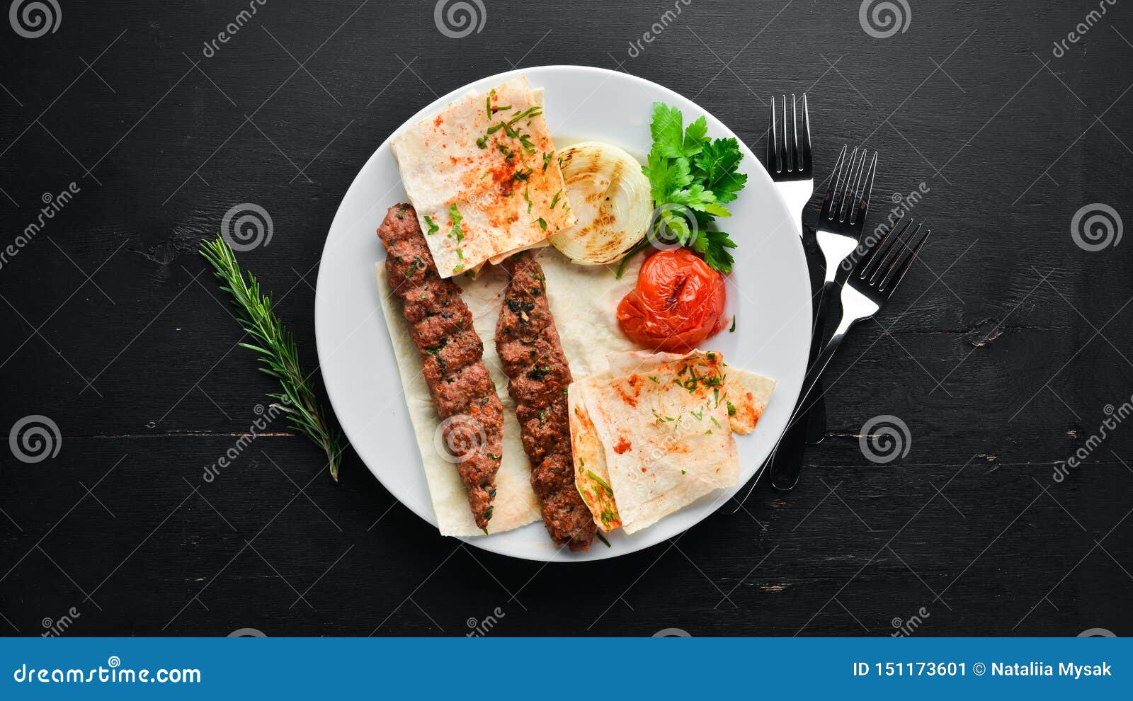 Lamb Kebab. Pita Bread and Spices. on a Black Background Stock Image