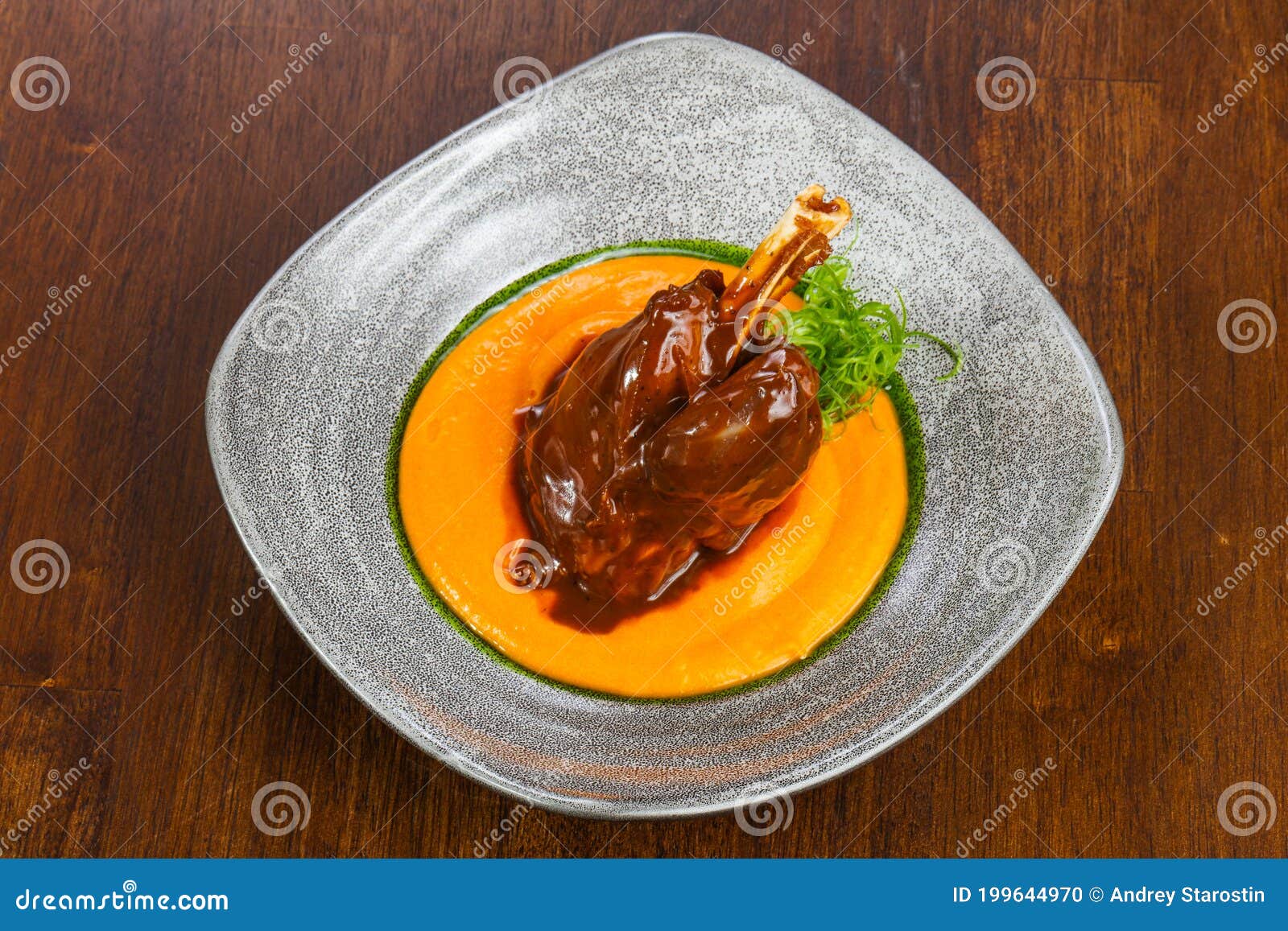 Lamb leg with cream sauce stock photo. Image of gastronomy 199644970