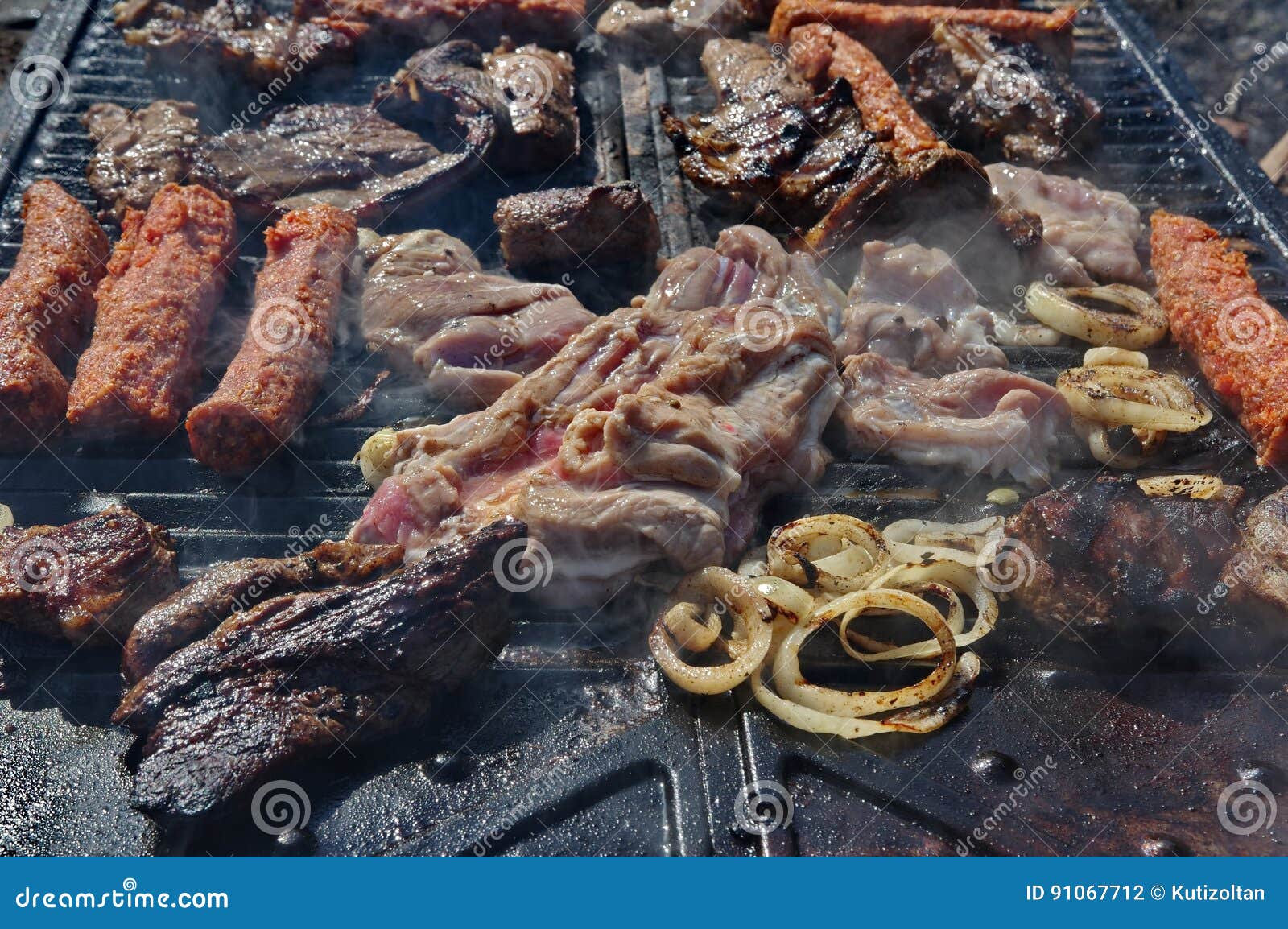 Lamb Steak on the Grill and Meat Rolls Stock Photo Image of cooked