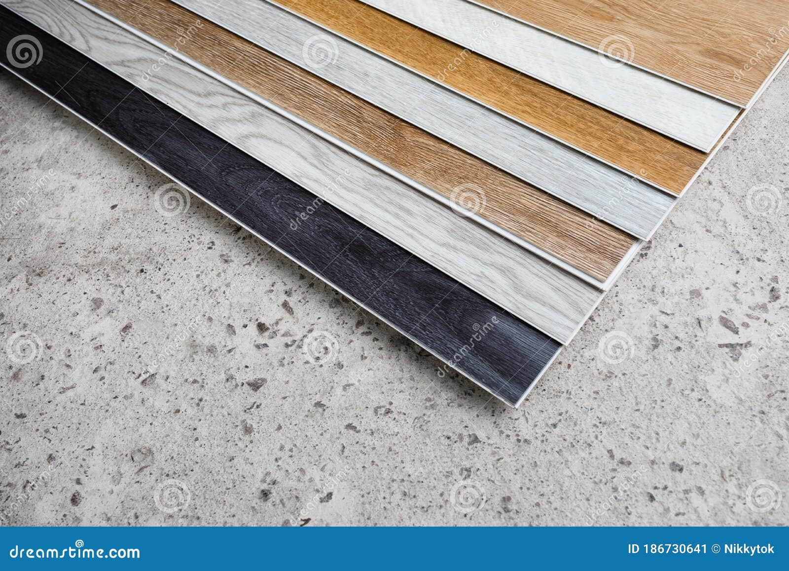 Laminate Flooring Planks Variations on Concrete Floor Stock Image