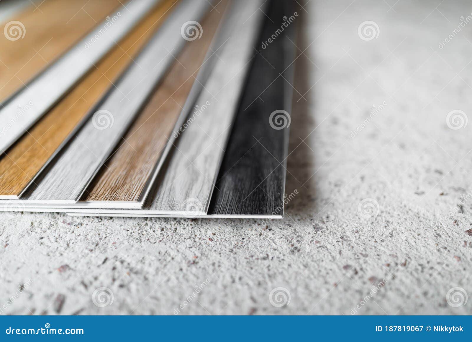 Laminate Flooring Planks Variations on Concrete Floor Stock Image