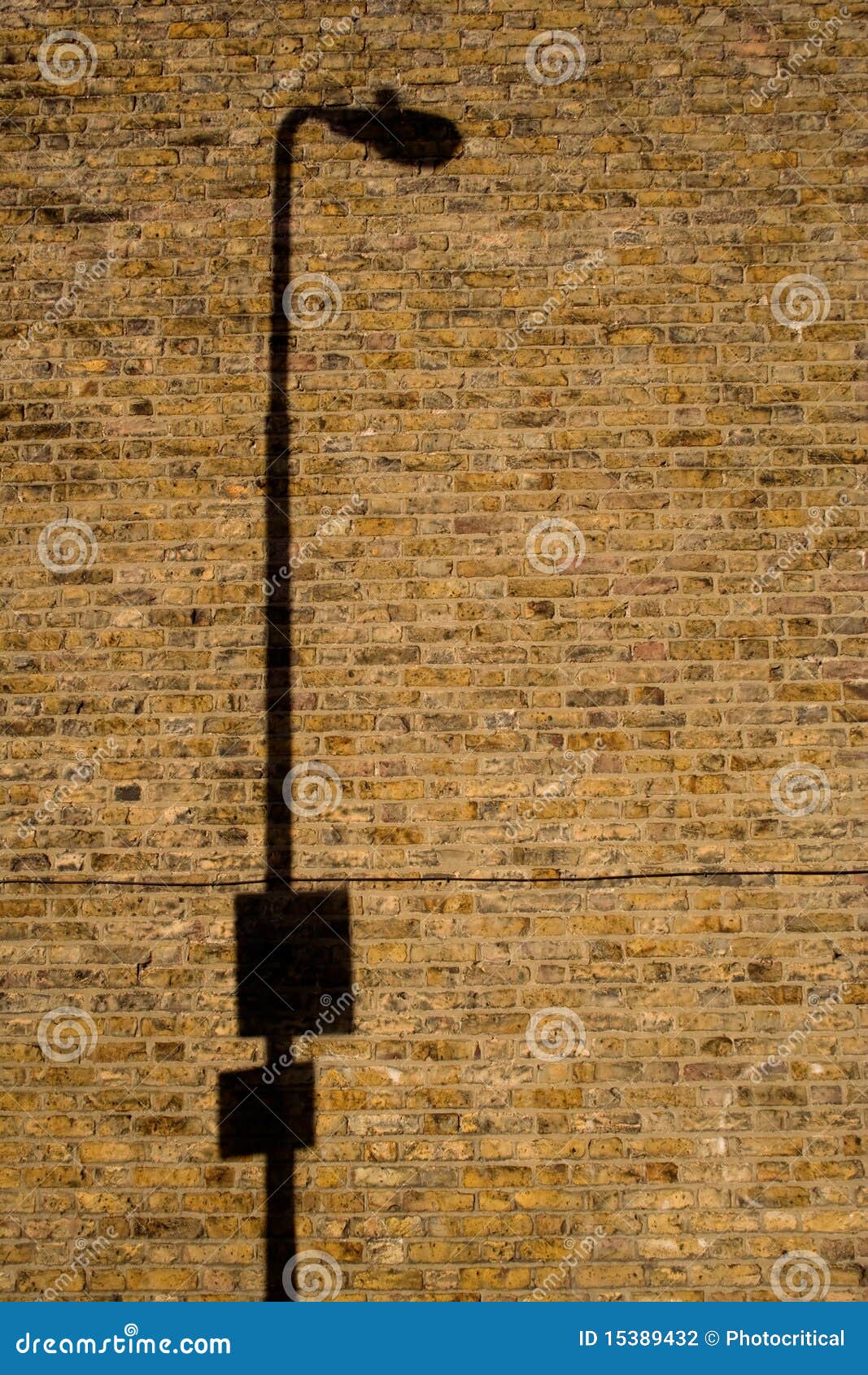 Lamp Post Shadow on Brick Wall Stock Photo - Image of urban, post: 15389432