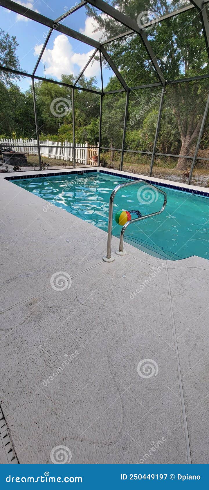 The Lanai with a Pool and Full Screen Enclosure Go Swimming Stock Image