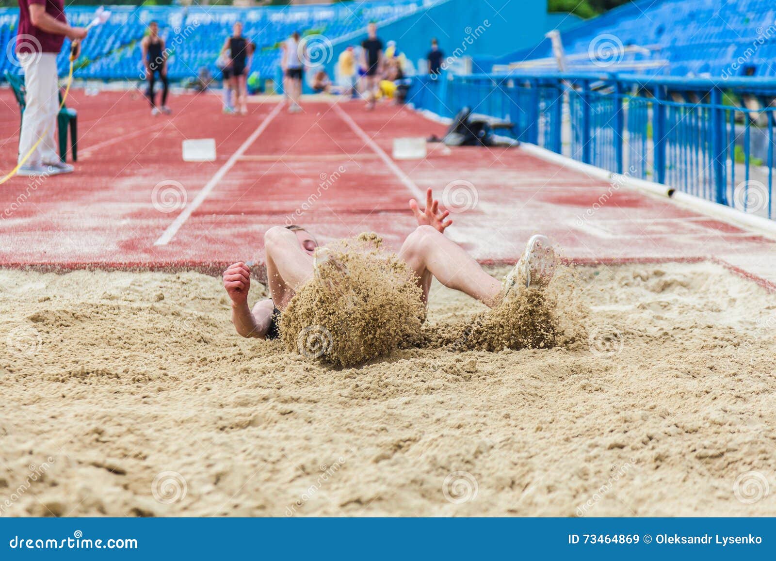 Landing in long jump editorial stock image. Image of action 73464869