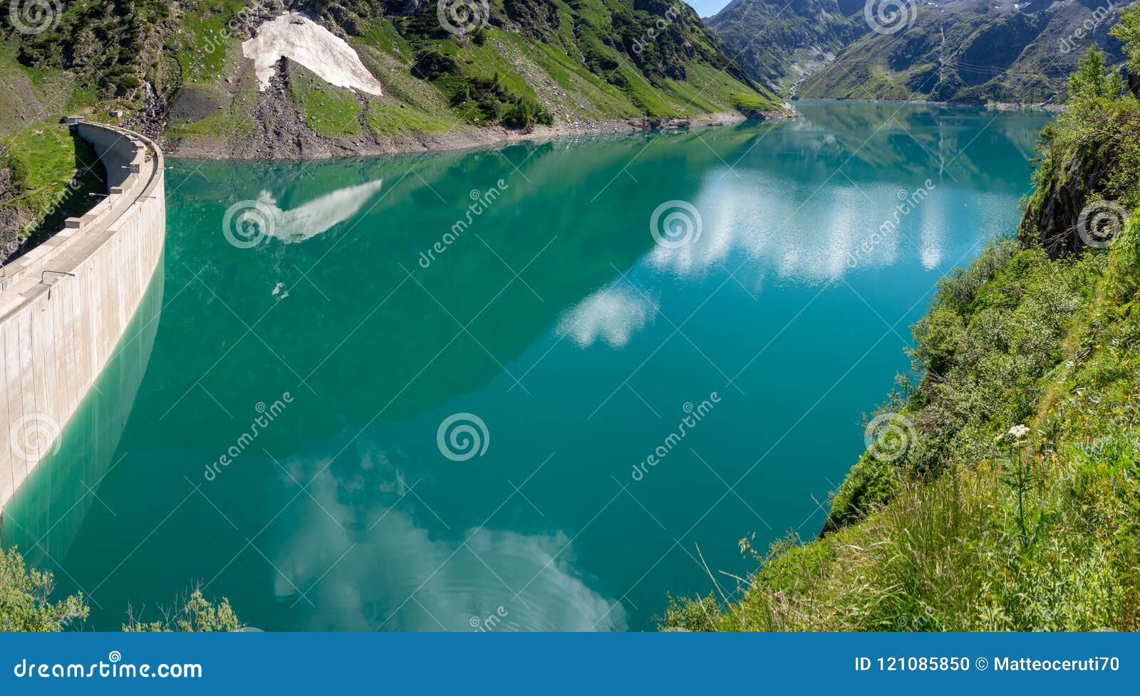 landscape of the dam of the lake barbellino, an alpine artificial lake. italian alps. italy