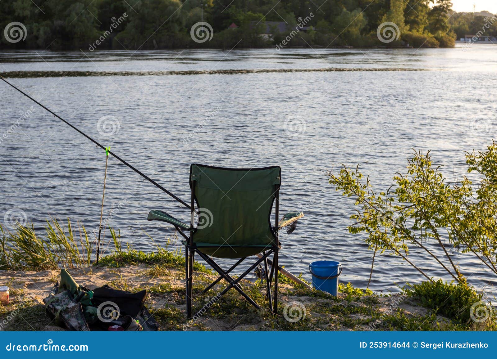 Landscape with a Fisherman S Chair and Fishing Rods on the Lake