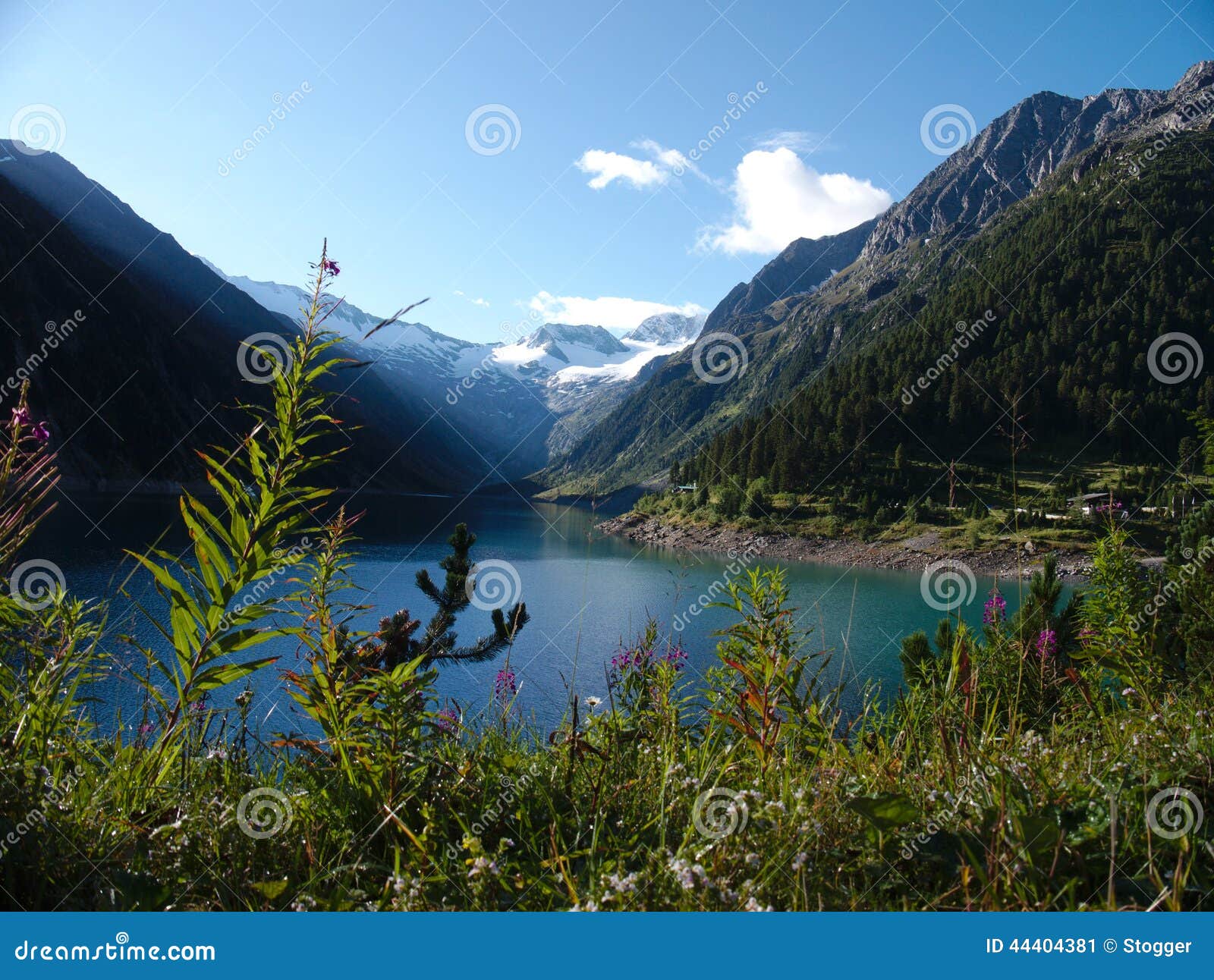 landscape with lake, mountains and blue sky