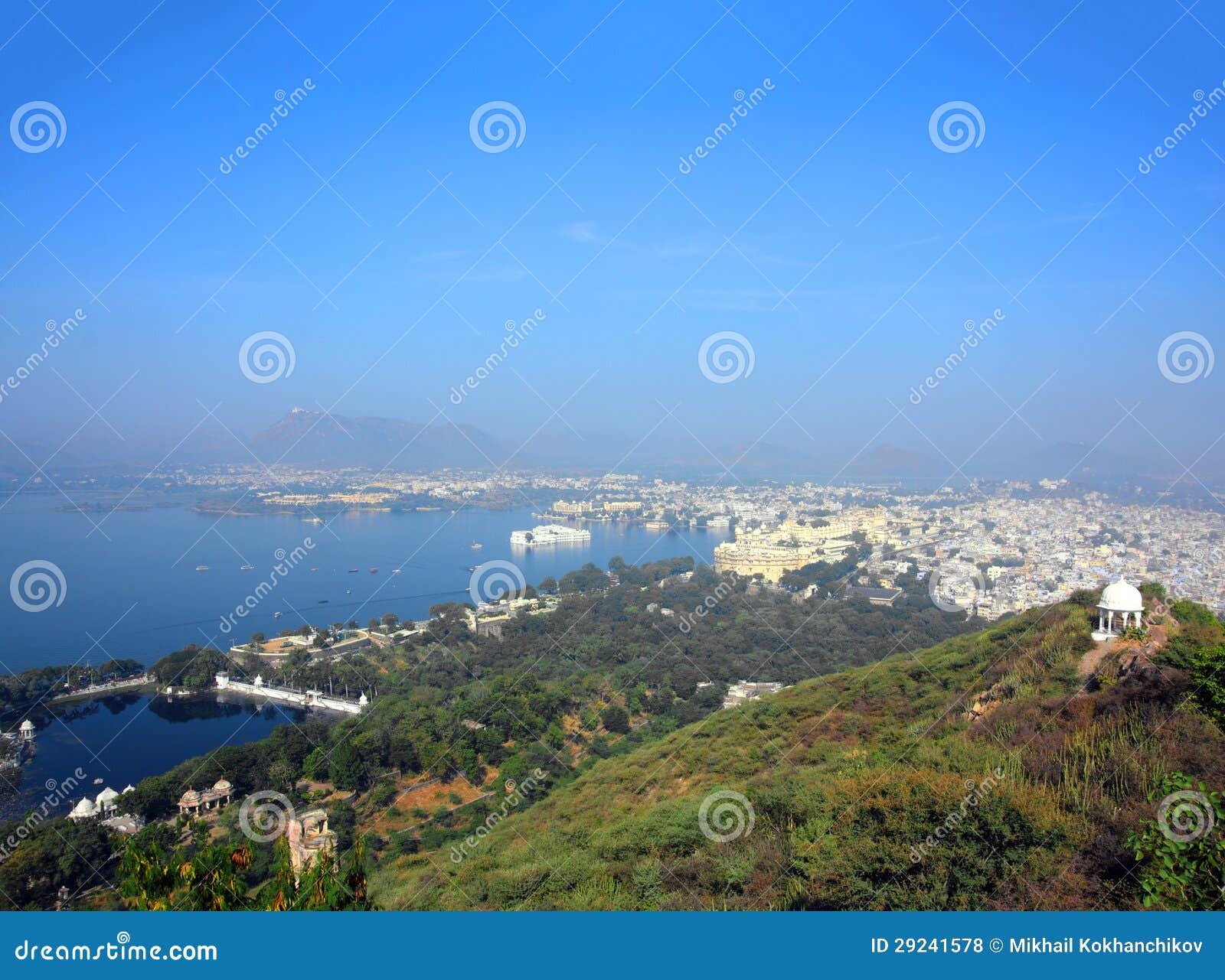 landscape with lake and palaces in udaipur
