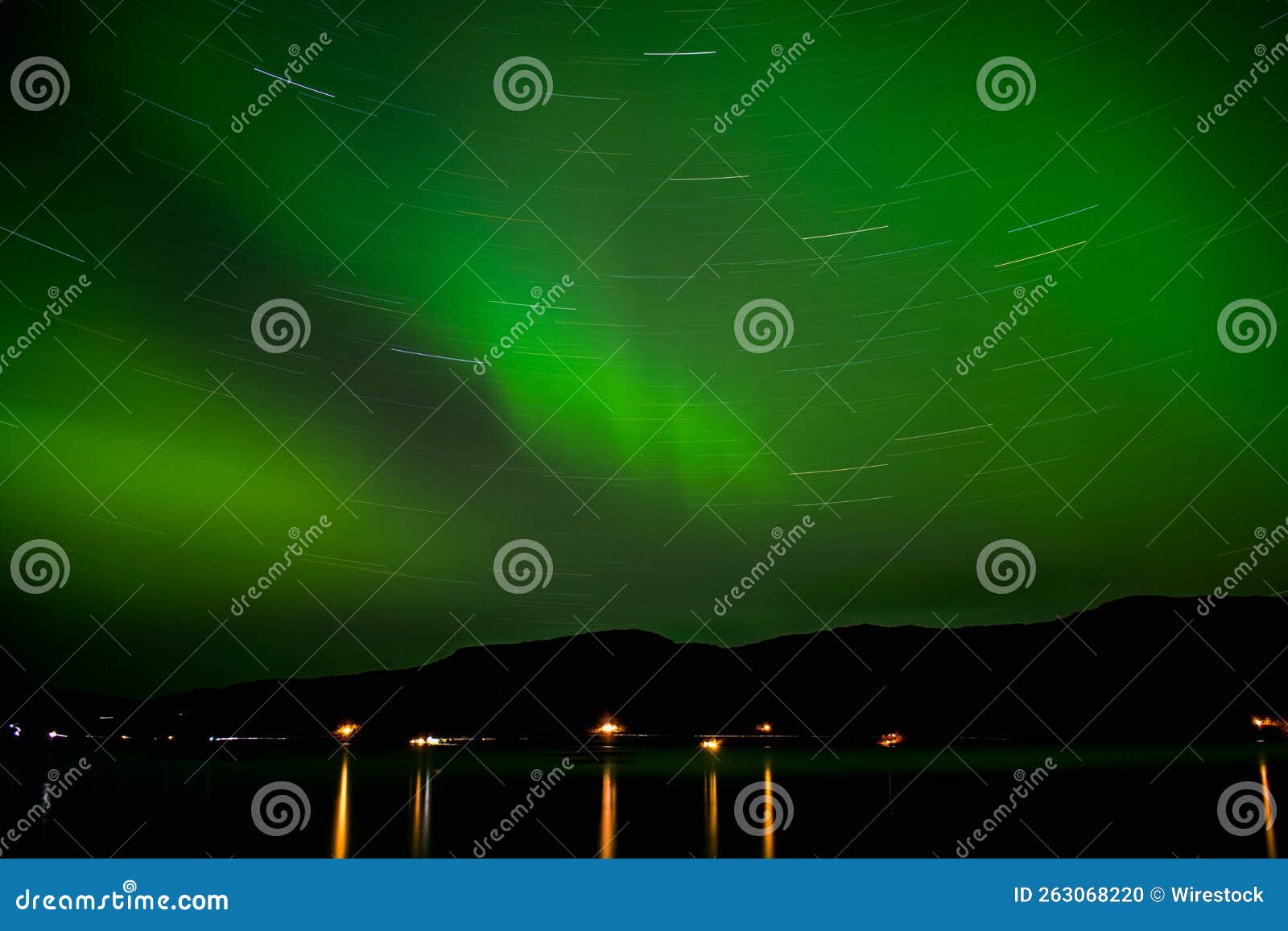 landscape-long exposure of green aurora boreal en kvaloya, noruega in norway