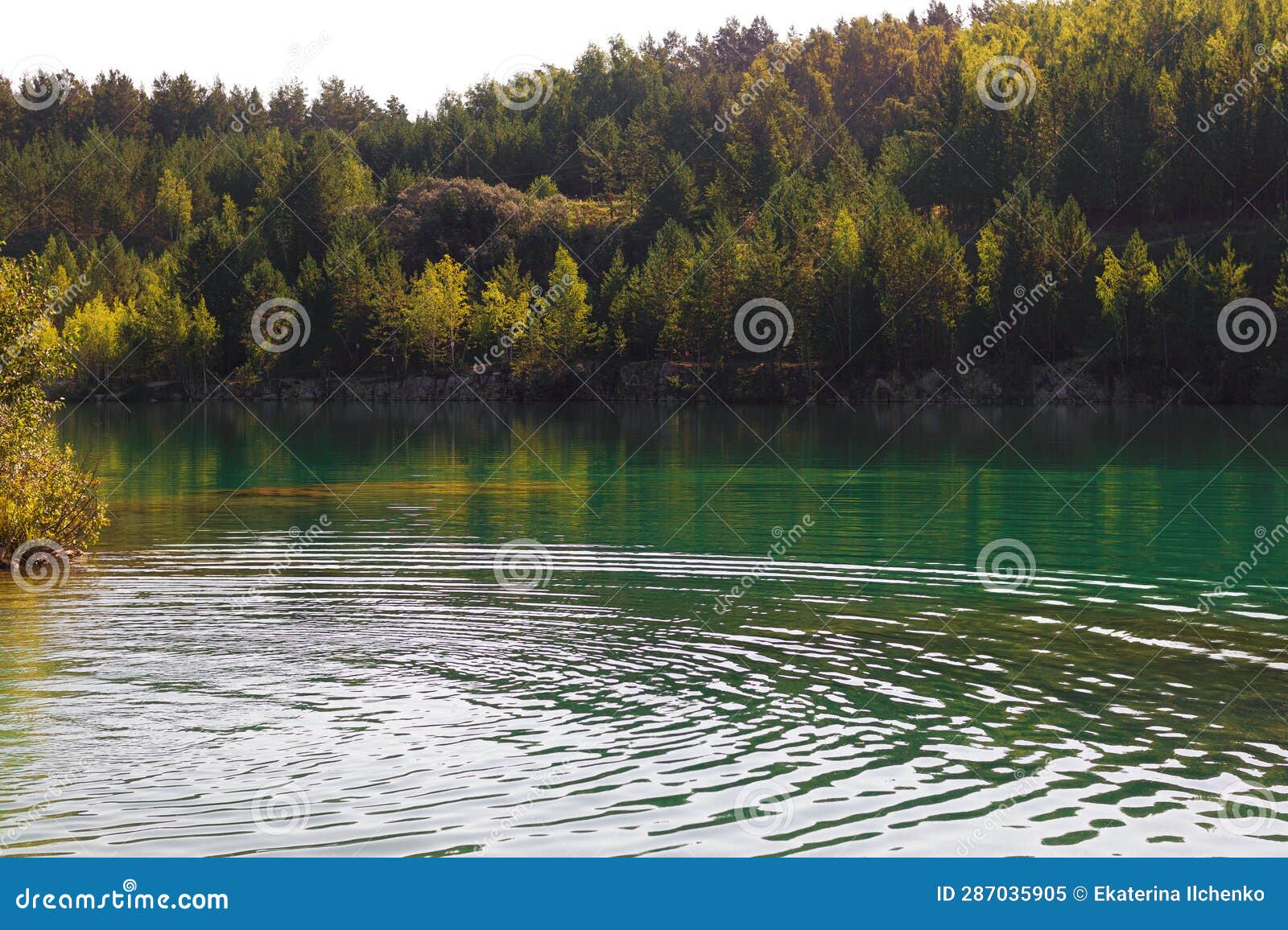 Landscape with marble lake stock image. Image of sunny 287035905