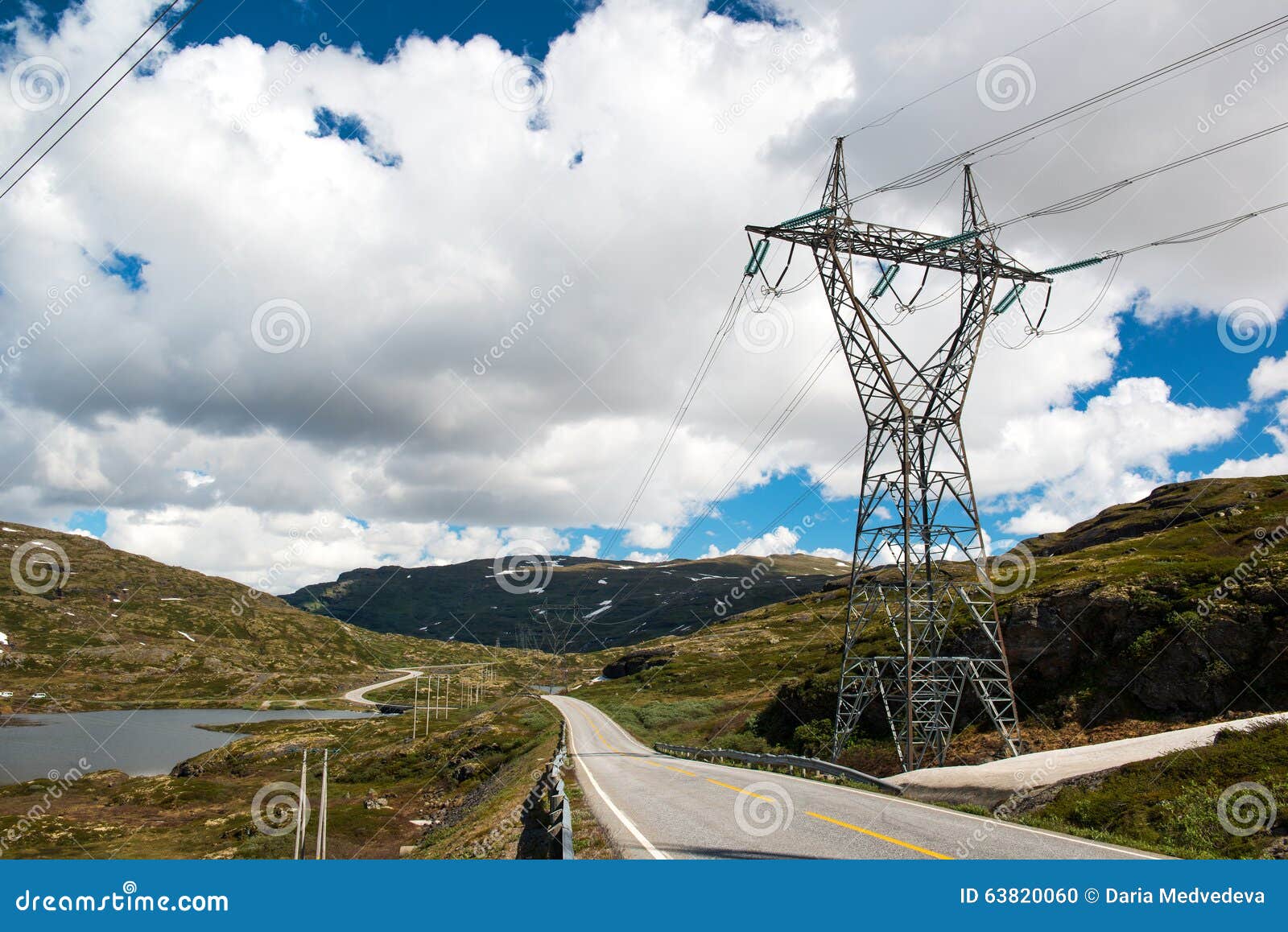 landscape with mountain road and high voltage reliance line, norway