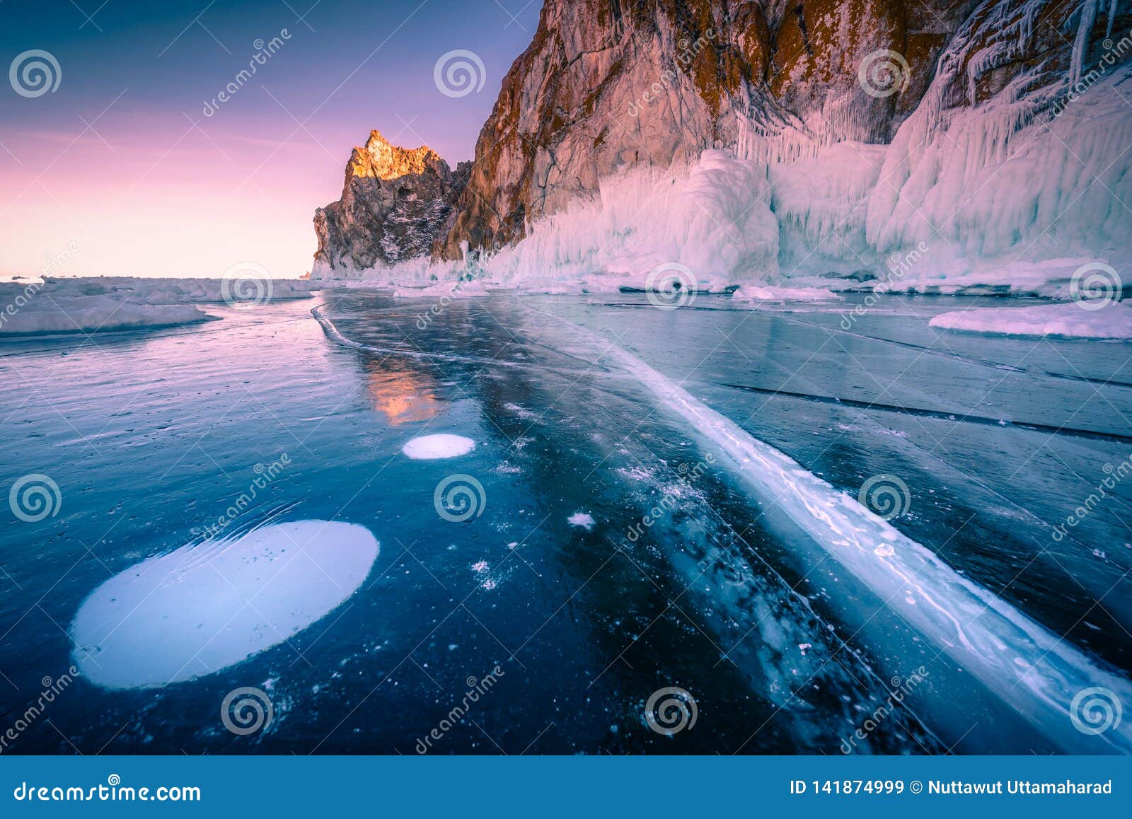 Landscape Of Mountain At Sunset With Natural Breaking Ice In Frozen