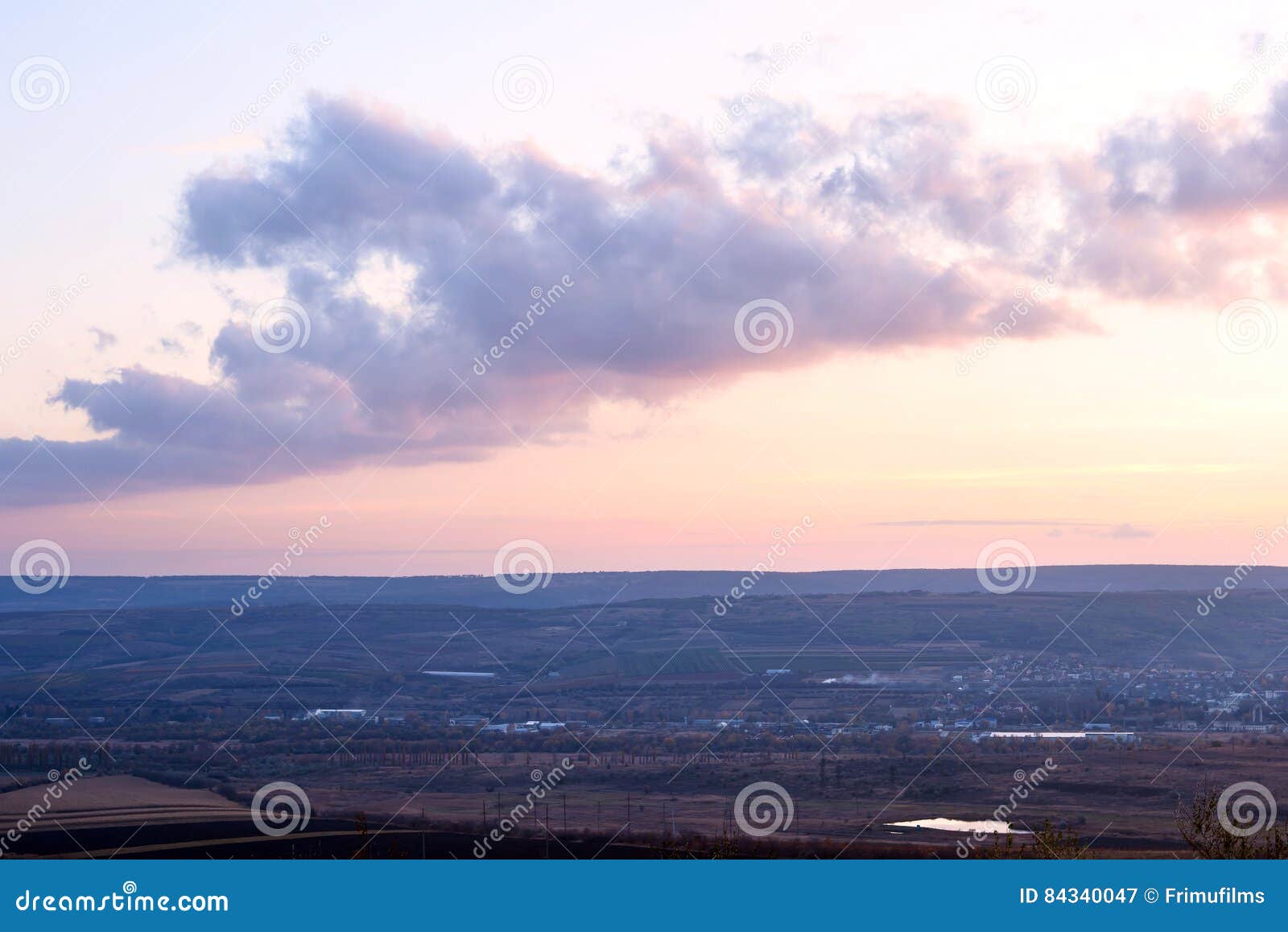 landscape of negresti village at purple sunset in moldova
