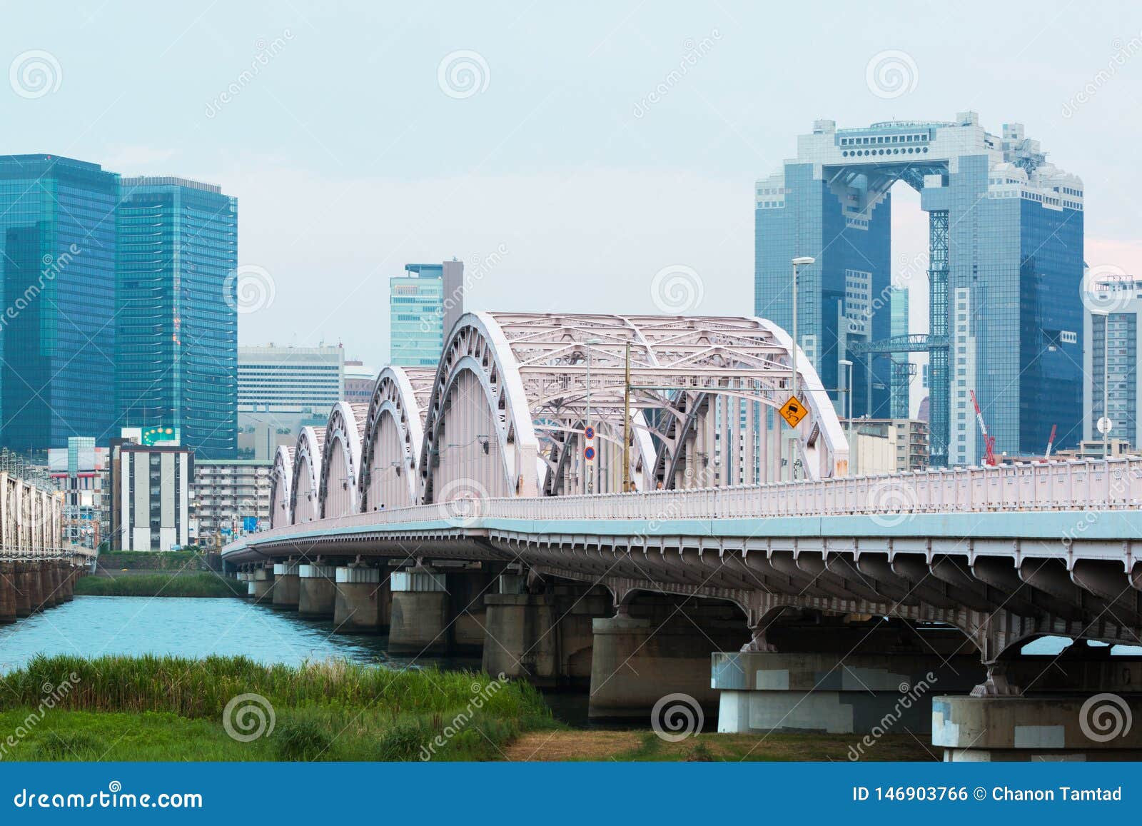 landscape of osaka city at umeda from across the yodogawa river