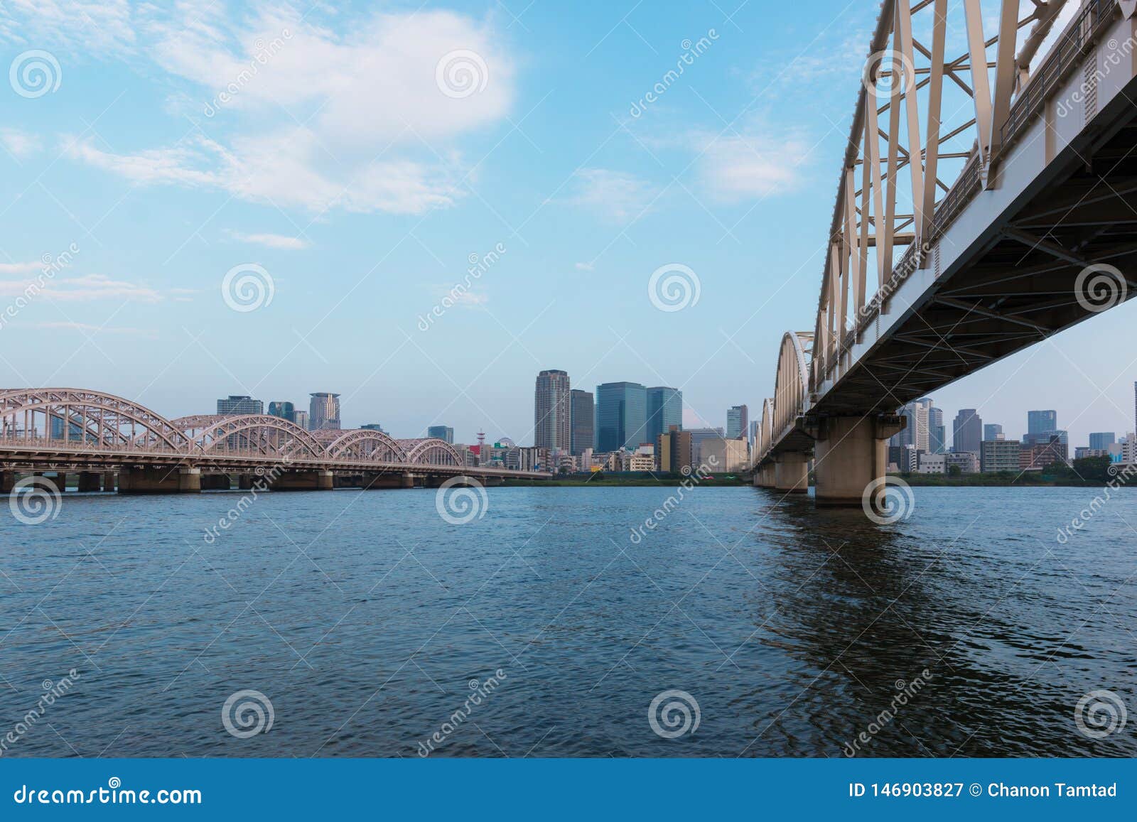 landscape of osaka city at umeda from across the yodogawa river