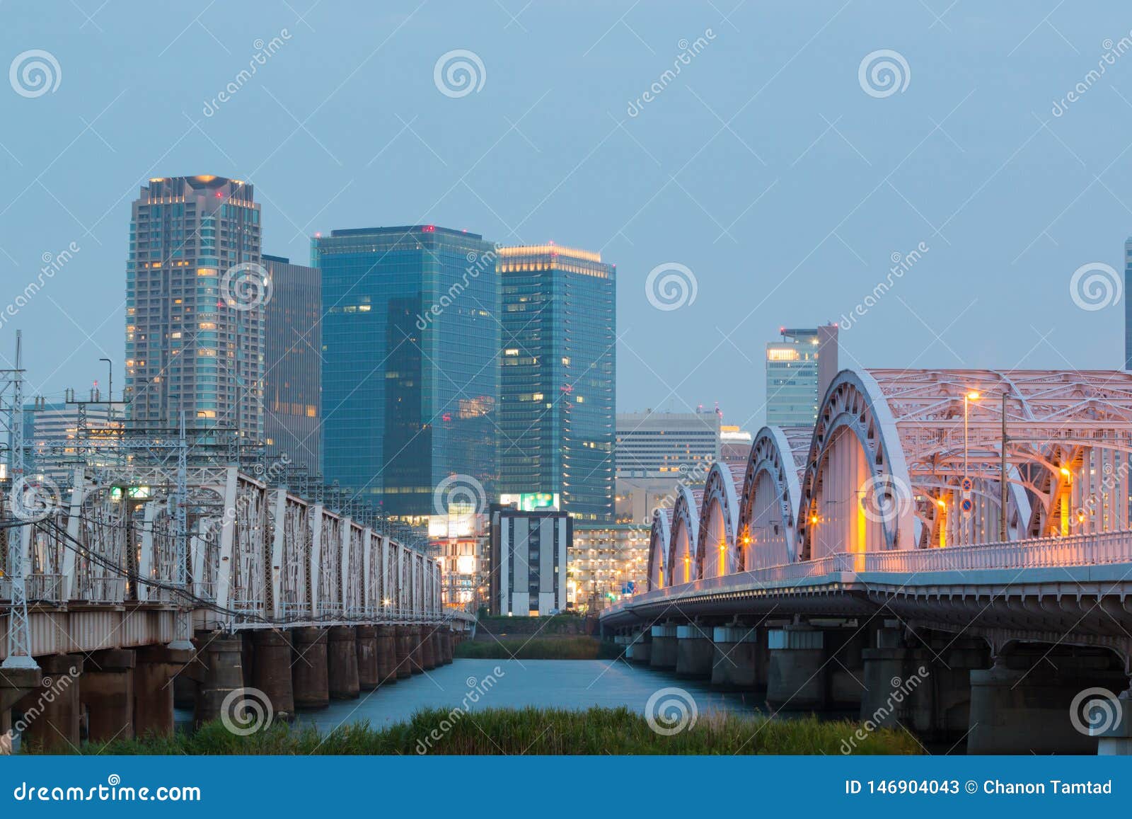 landscape of osaka city at umeda from across the yodogawa river