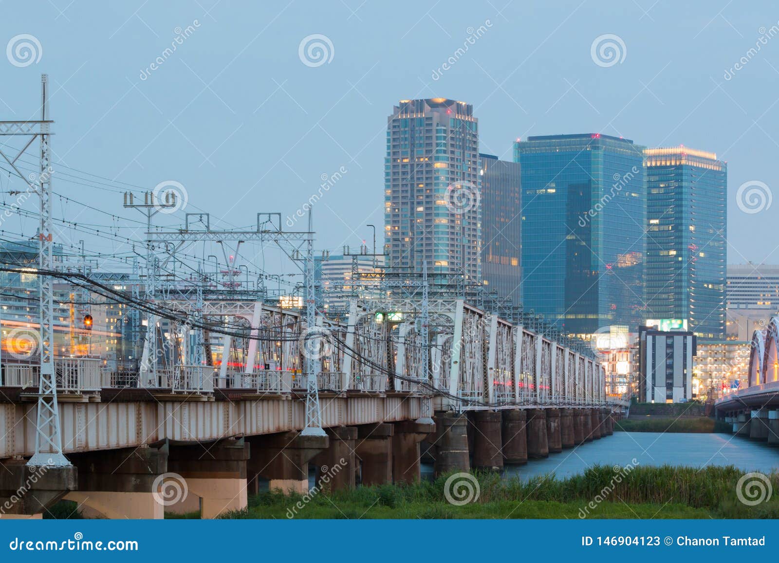 landscape of osaka city at umeda from across the yodogawa river