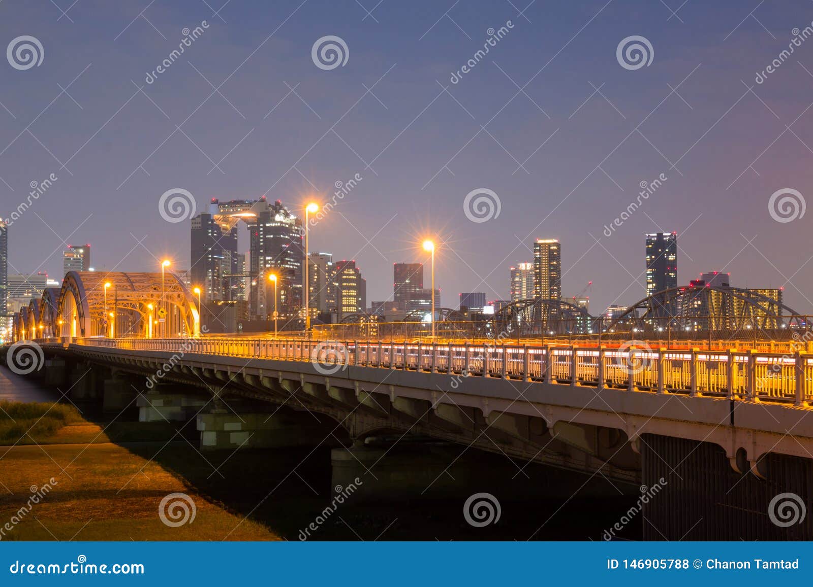 landscape of osaka city at umeda from across the yodogawa river