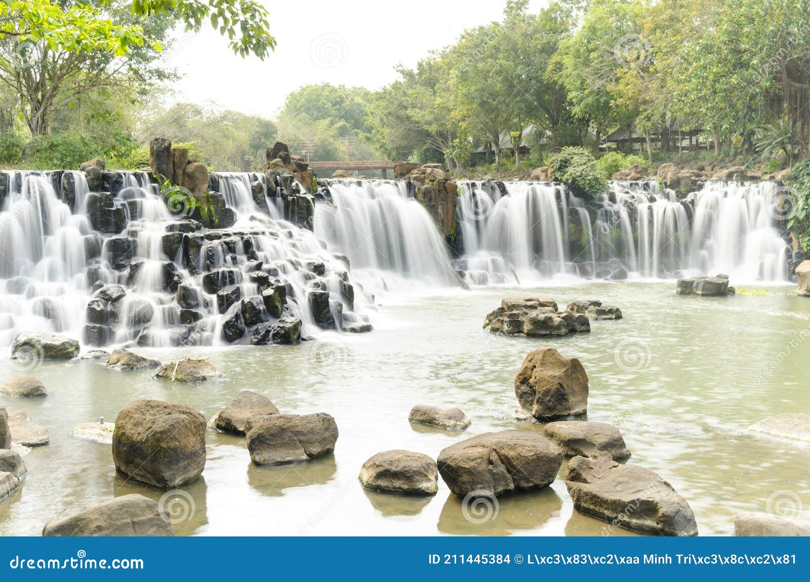 Giang Dien Waterfall, Dong Nai, Vietnam view from above with long exposure  photography makes the water smooth as silk. It attracts tourists weekend  resort Stock Photo