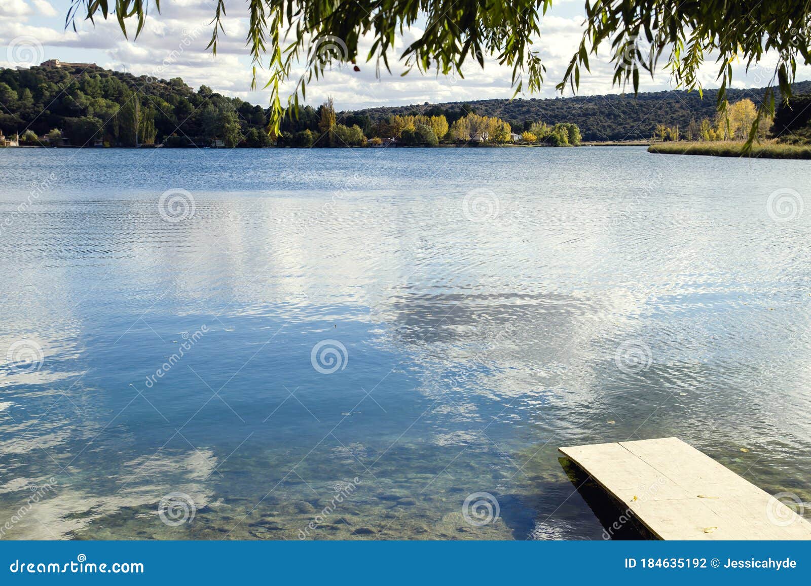 landscape with a pier in lagunas de ruidera natural park