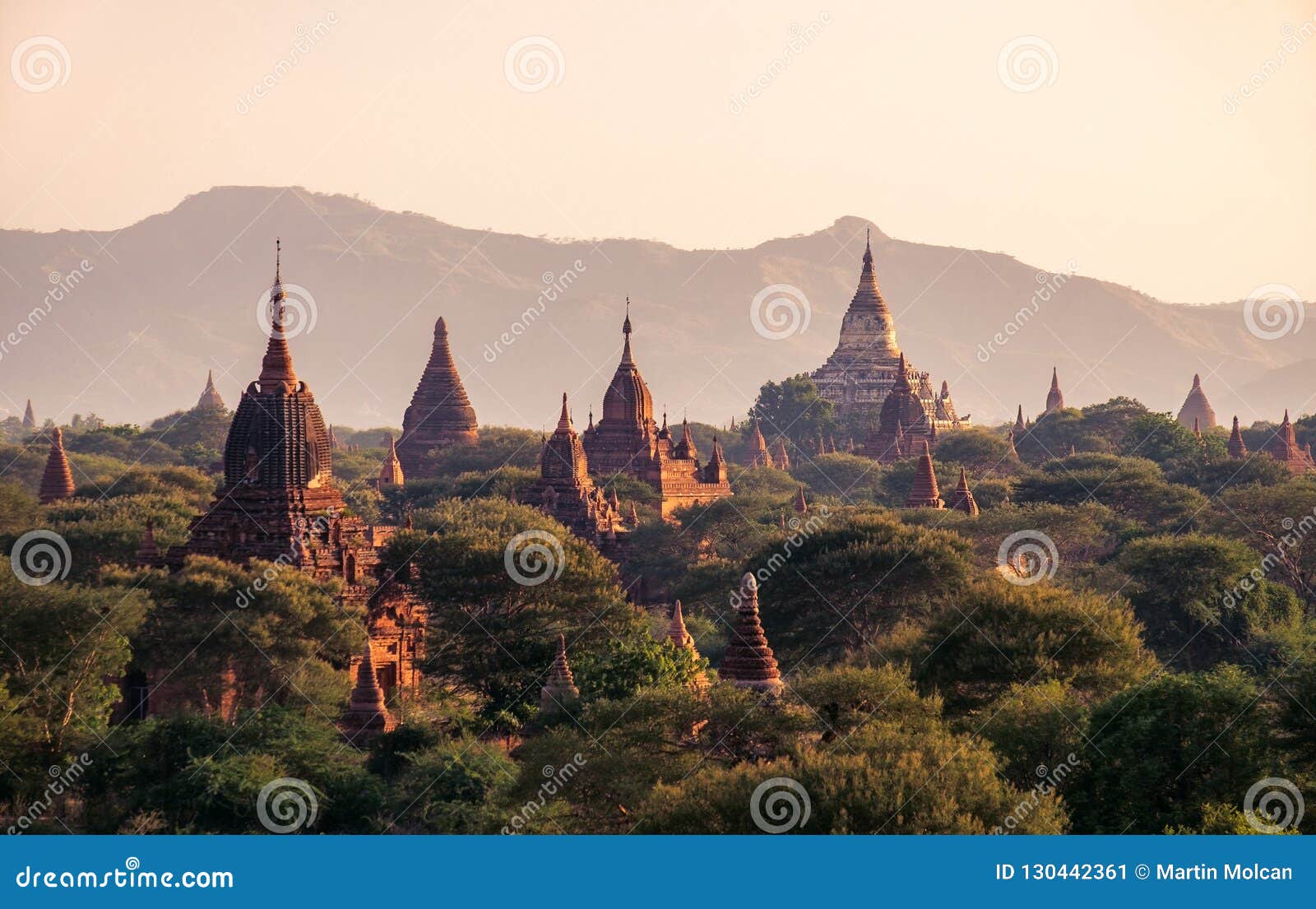 landscape view of ancient temples at colorful golden sunset, bagan, myanmar