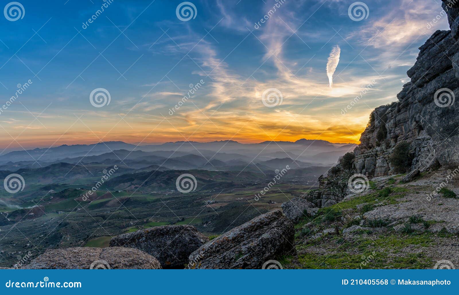 landscape view of the el torcal rock formations and the montes de malaga nature park in andalusia at sunset