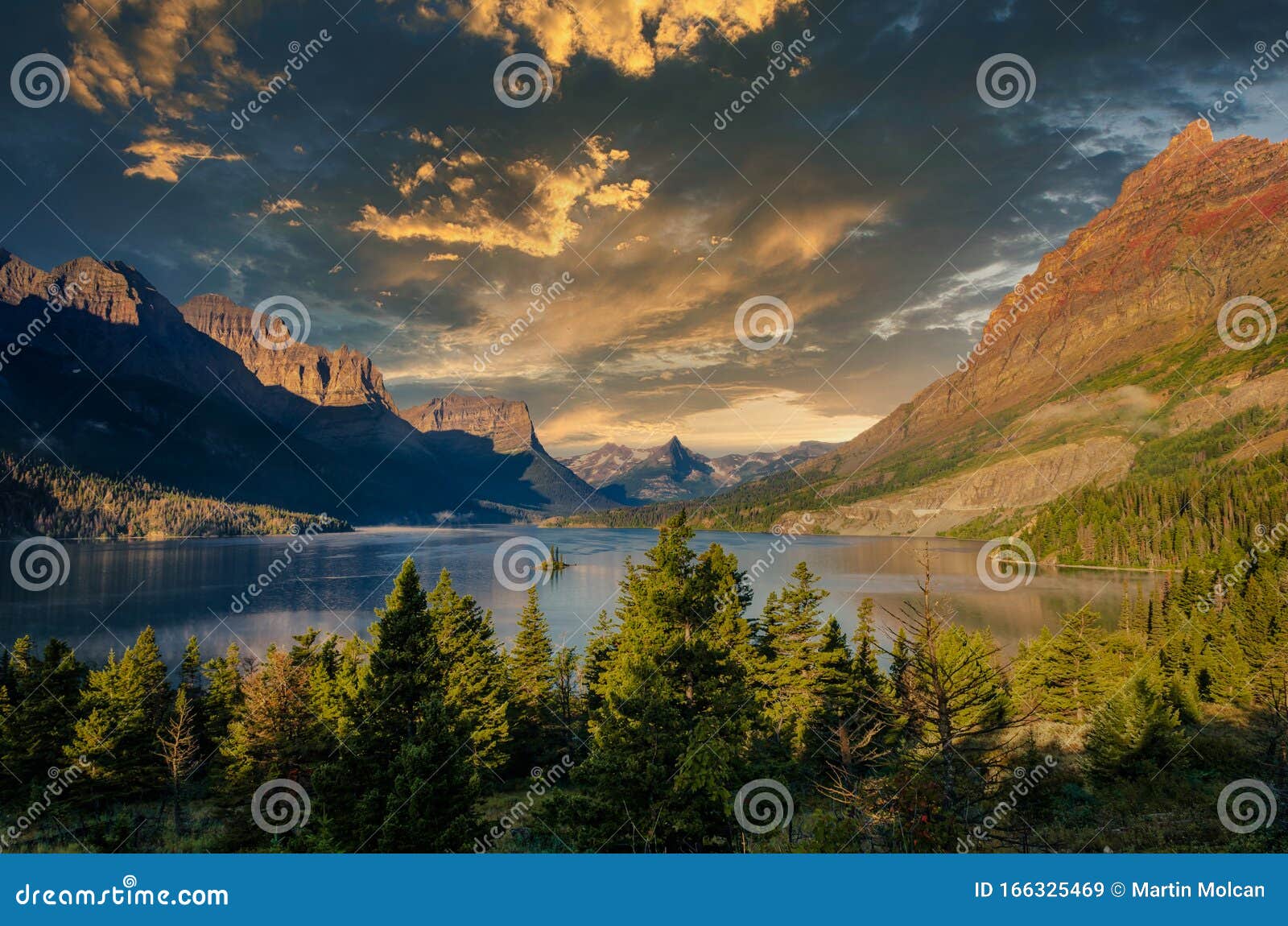 landscape view of lake and mountain range in glacier np, montana, us