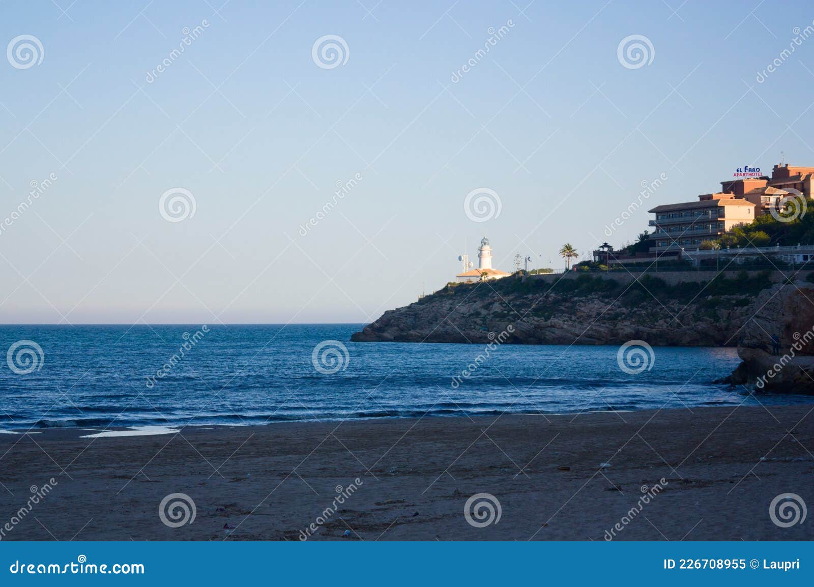 lighthouse of the dosel beach in the coastal town of cullera valencia