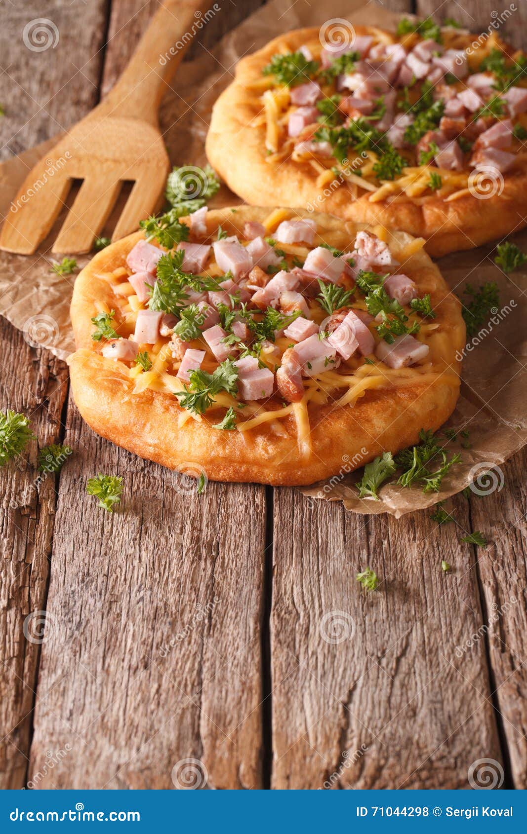 Langos Deep Fried With Cheese And Ham Closeup. Horizontal Top V