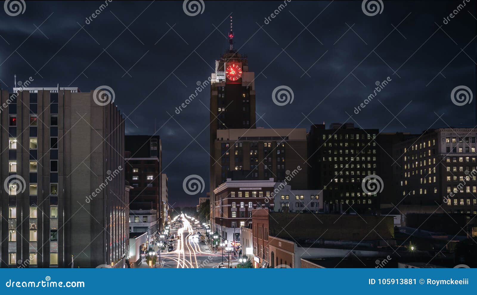 lansing michigan cityscape at night with traffic