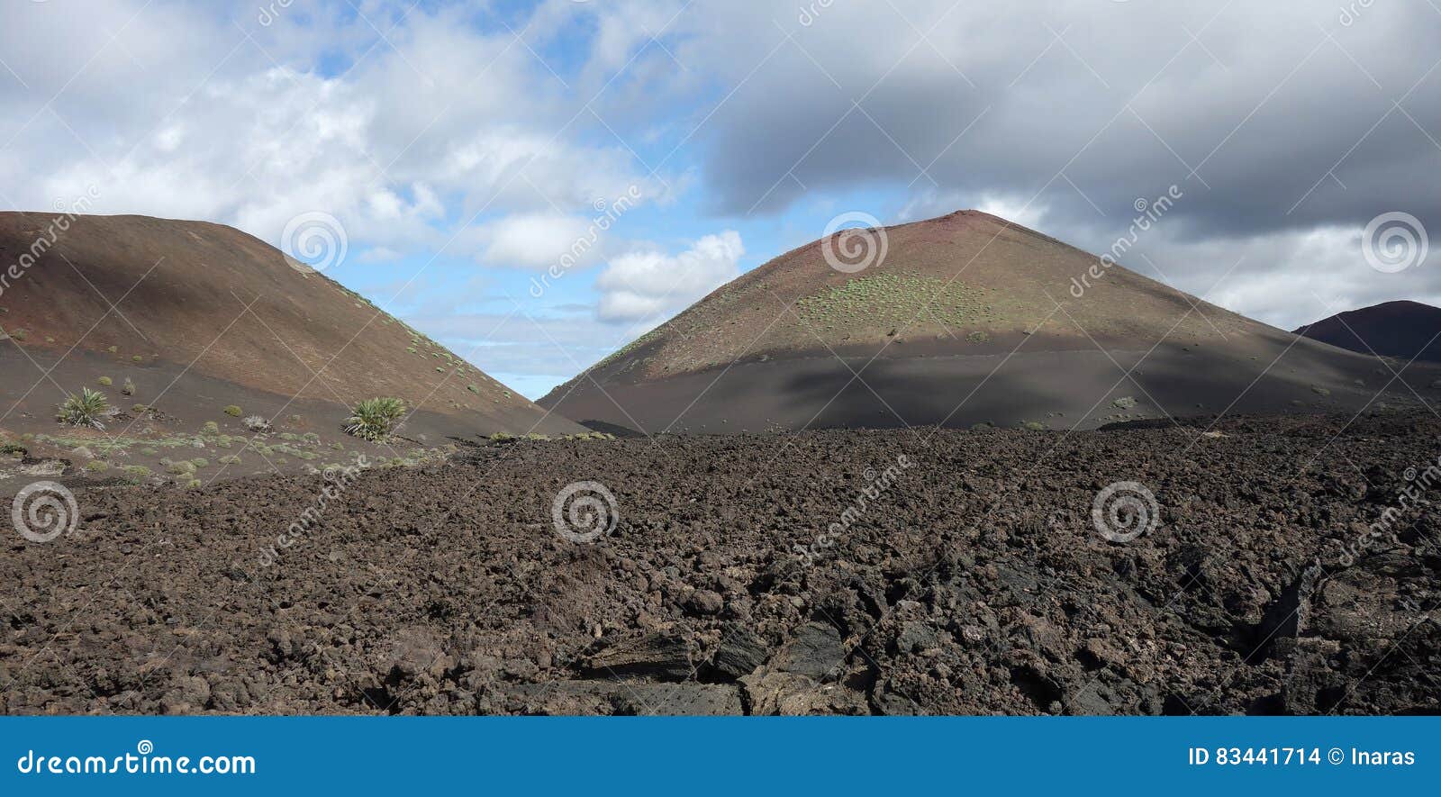 lanzarote - montana de pedro perico with lava field in front
