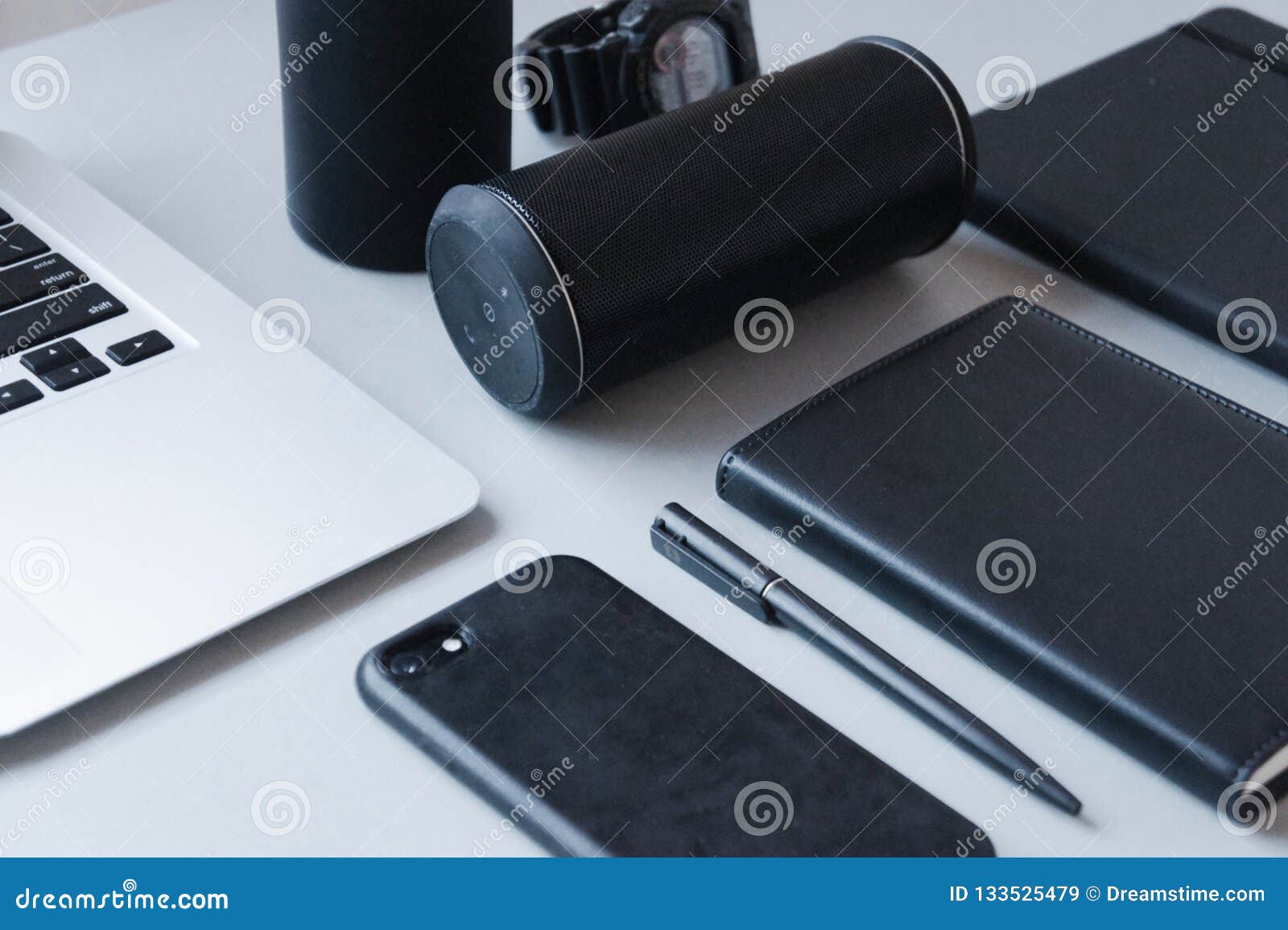 Laptop Black Phone Black Notebook And Black Pen With Black
