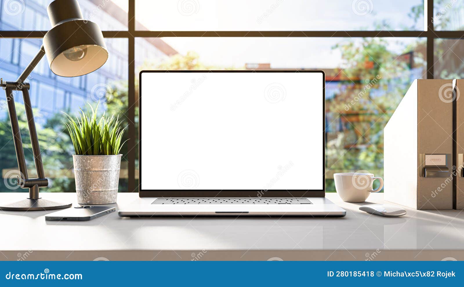 a laptop with a blank frameless screen mockup template is positioned on a table in an office interior, offering a front view, with