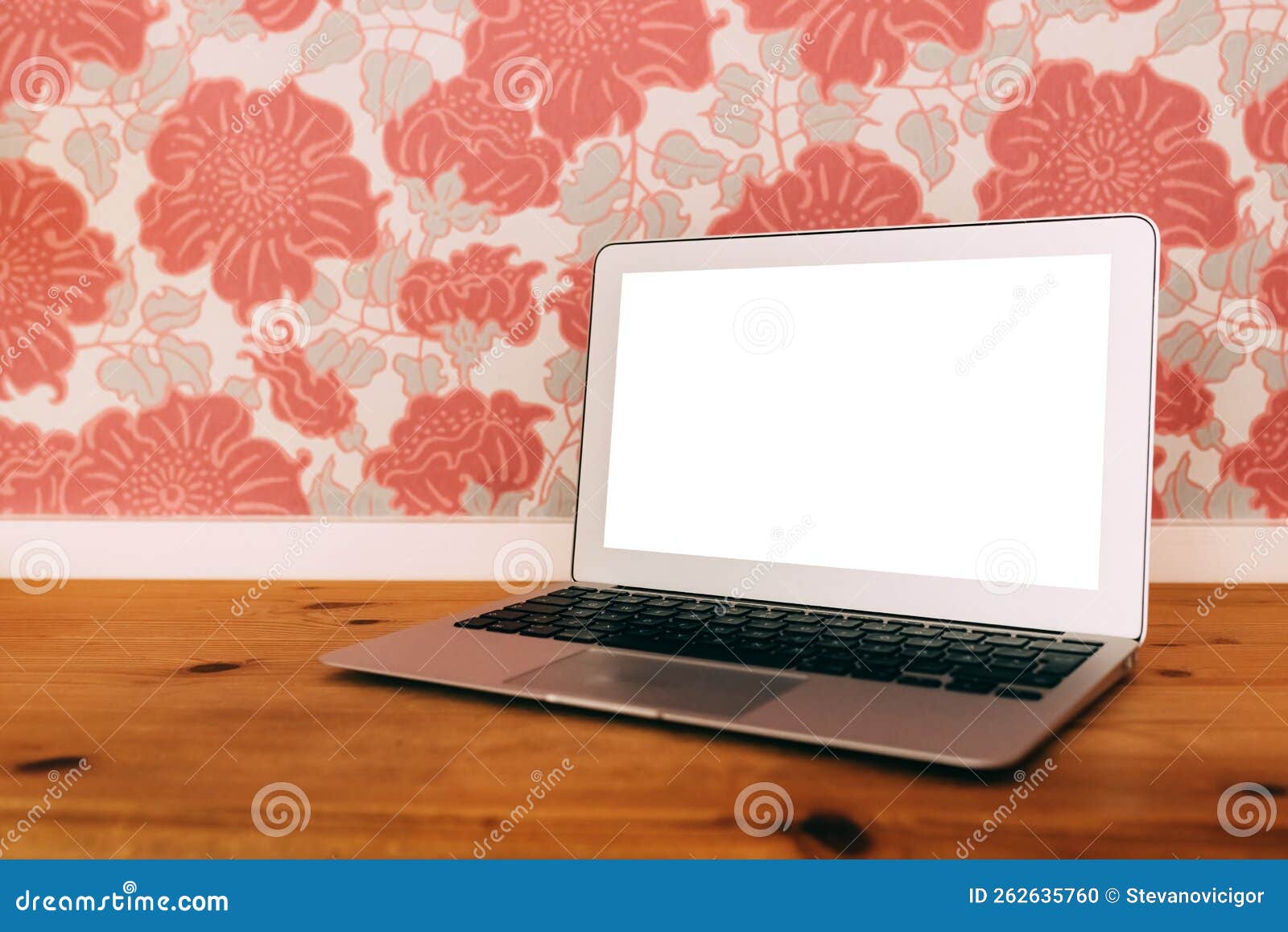 Laptop Computer with Blank Mockup Screen on Living Room Desk Stock