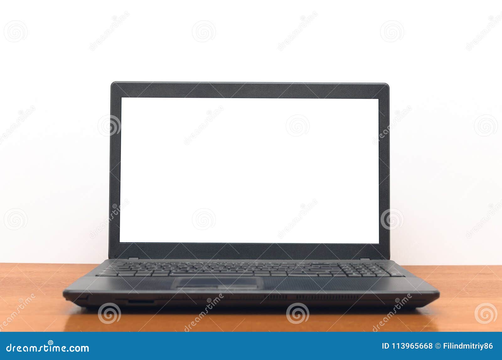 Laptop Computer With Blank White Screen On The Desk Table Stock