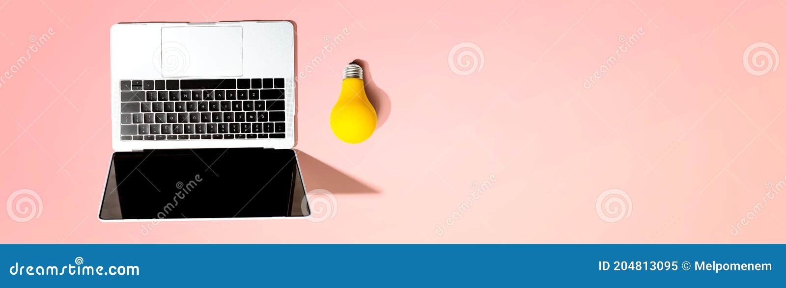 Laptop Computer with a Yellow Light Bulb Stock Image Image of pink, digital 204813095