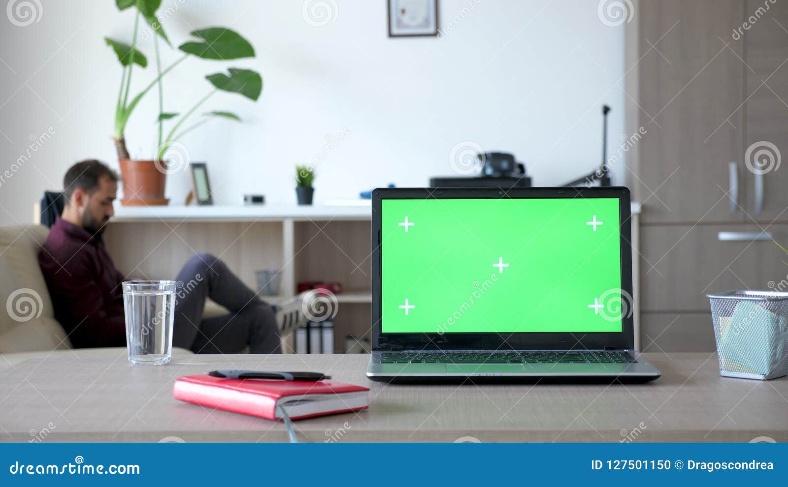 Laptop On The Desk With A Green Screen In The House Stock Footage