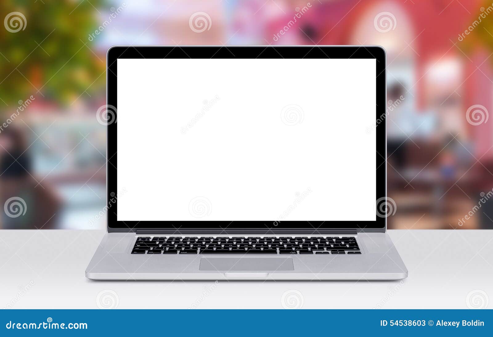 laptop on the desk surface in coffee shop mockup