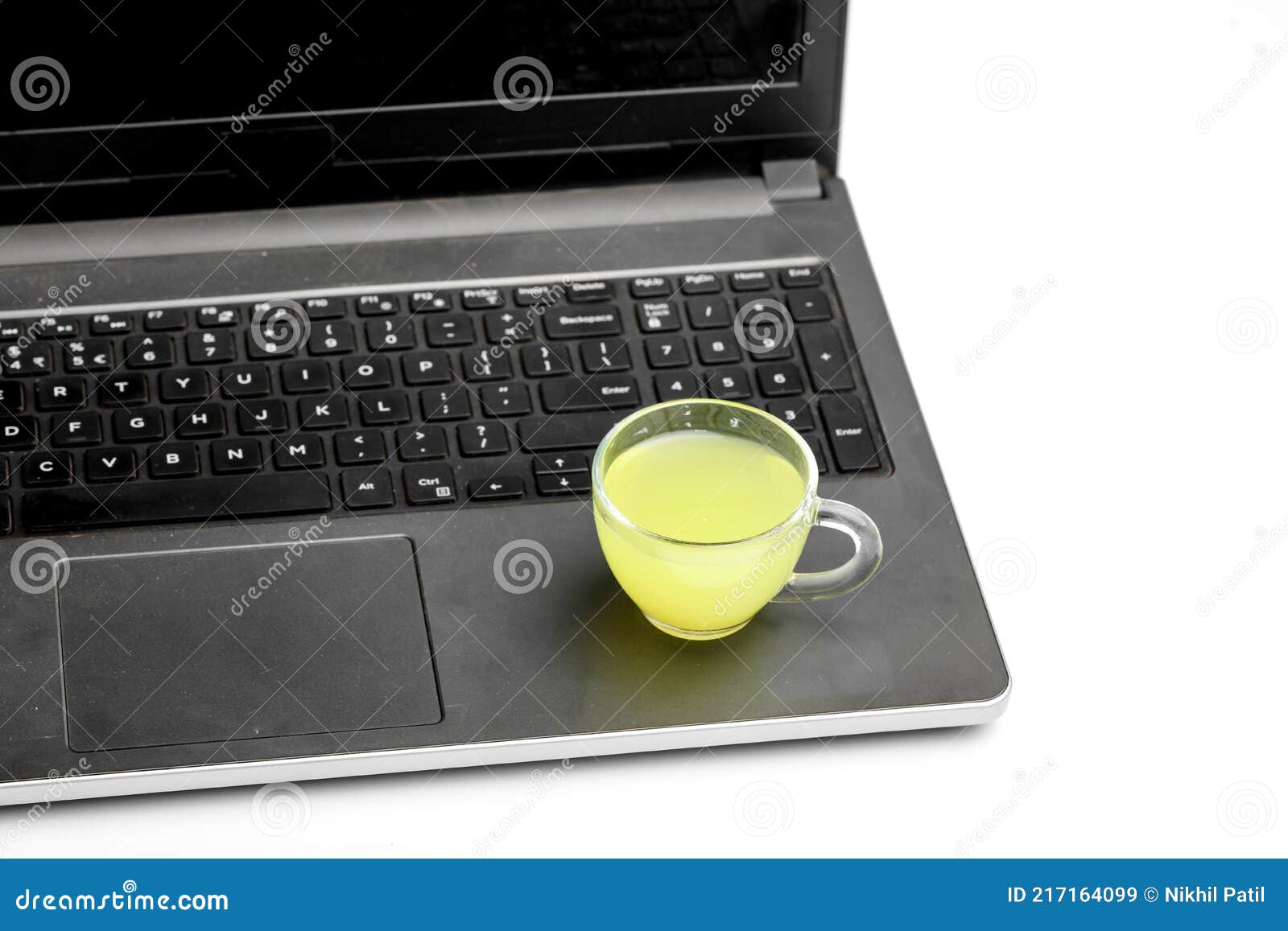 Laptop and Diary with Cup of Green Tea. Work from Home Concept Stock