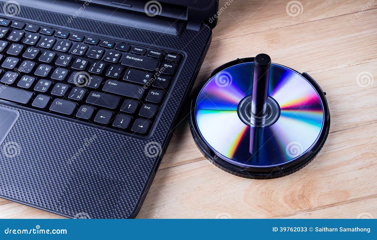 Laptop with dvd disk stock image. Image of drive, data 39762033