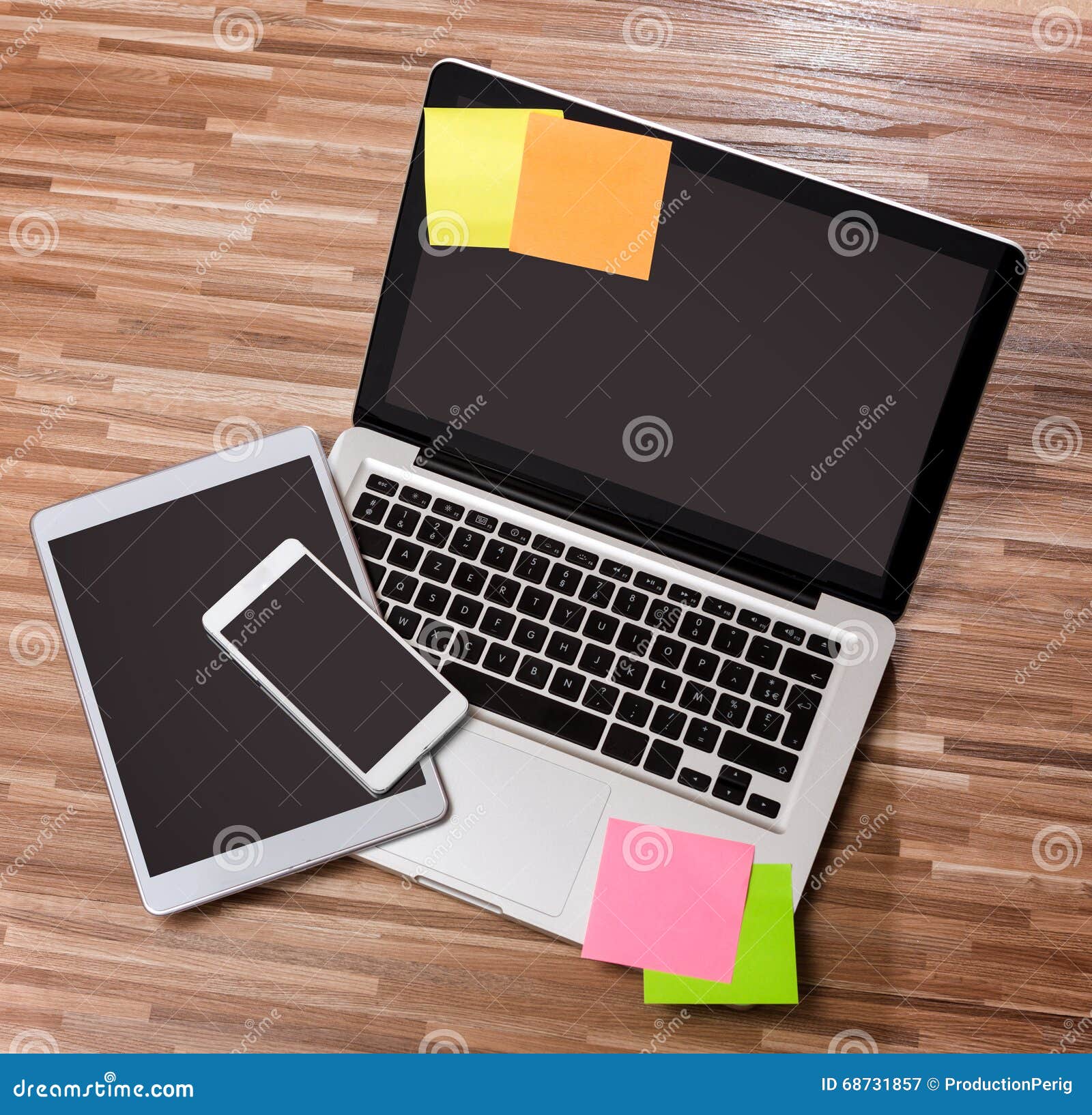 Laptop in High Definition with Tablet and Mobile Phone on a Wood Stock