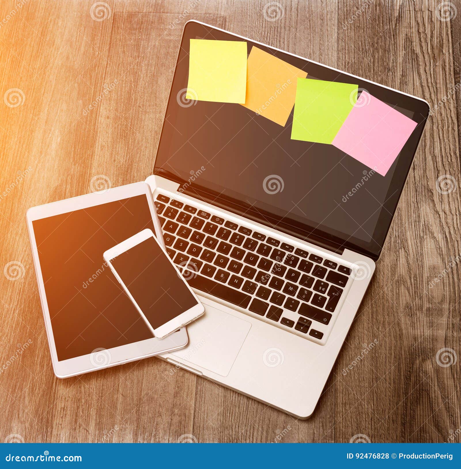 Laptop in High Definition with Tablet and Mobile Phone on a Wood Stock