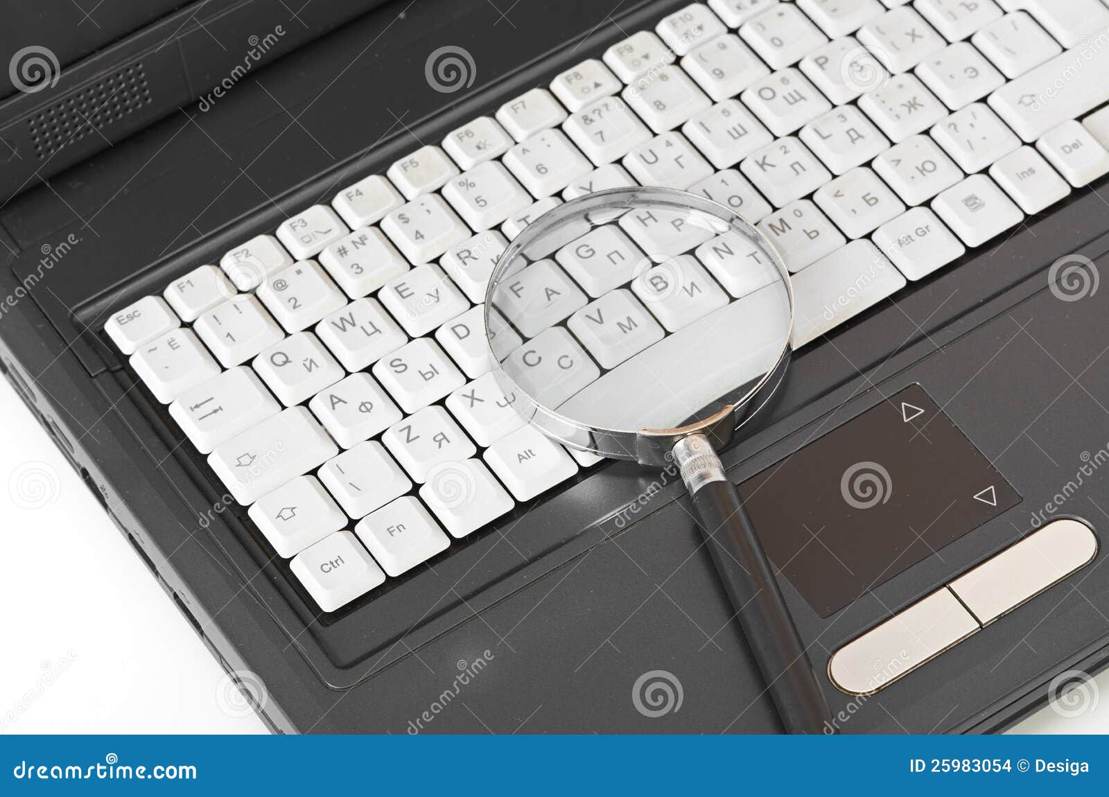Laptop with a Magnify Glass Stock Photo Image of examining, discovery