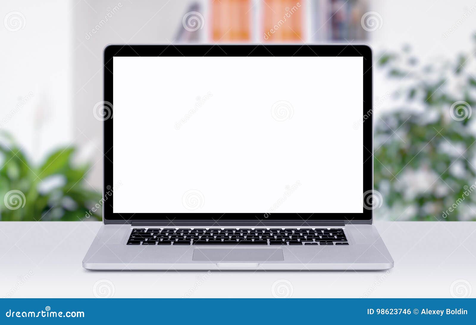 macbook laptop mockup on table in office space