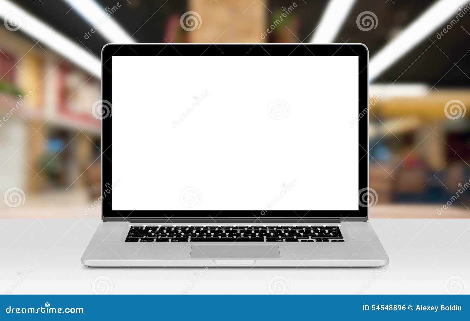 laptop mockup with white blank display on the desk in office